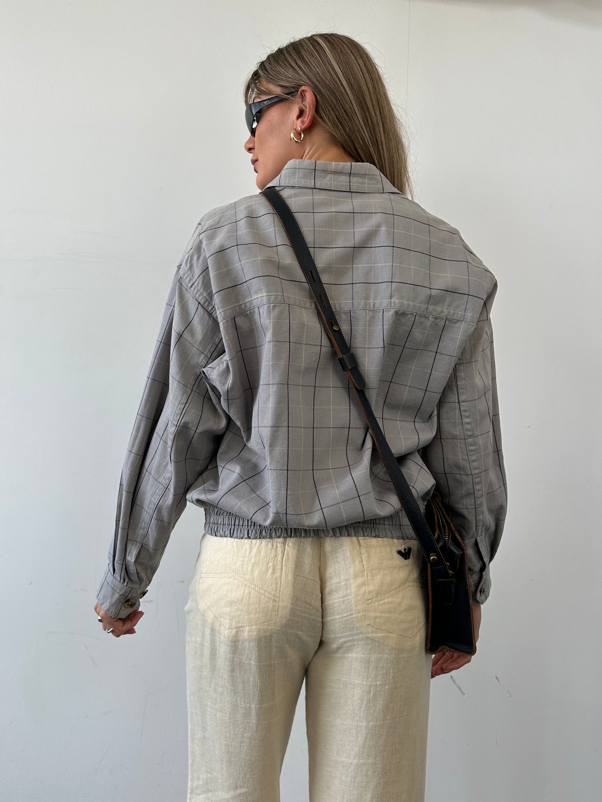 Aquascutum check cotton bomber jacket in size S with classic pattern and tailored fit, shown on a plain background.