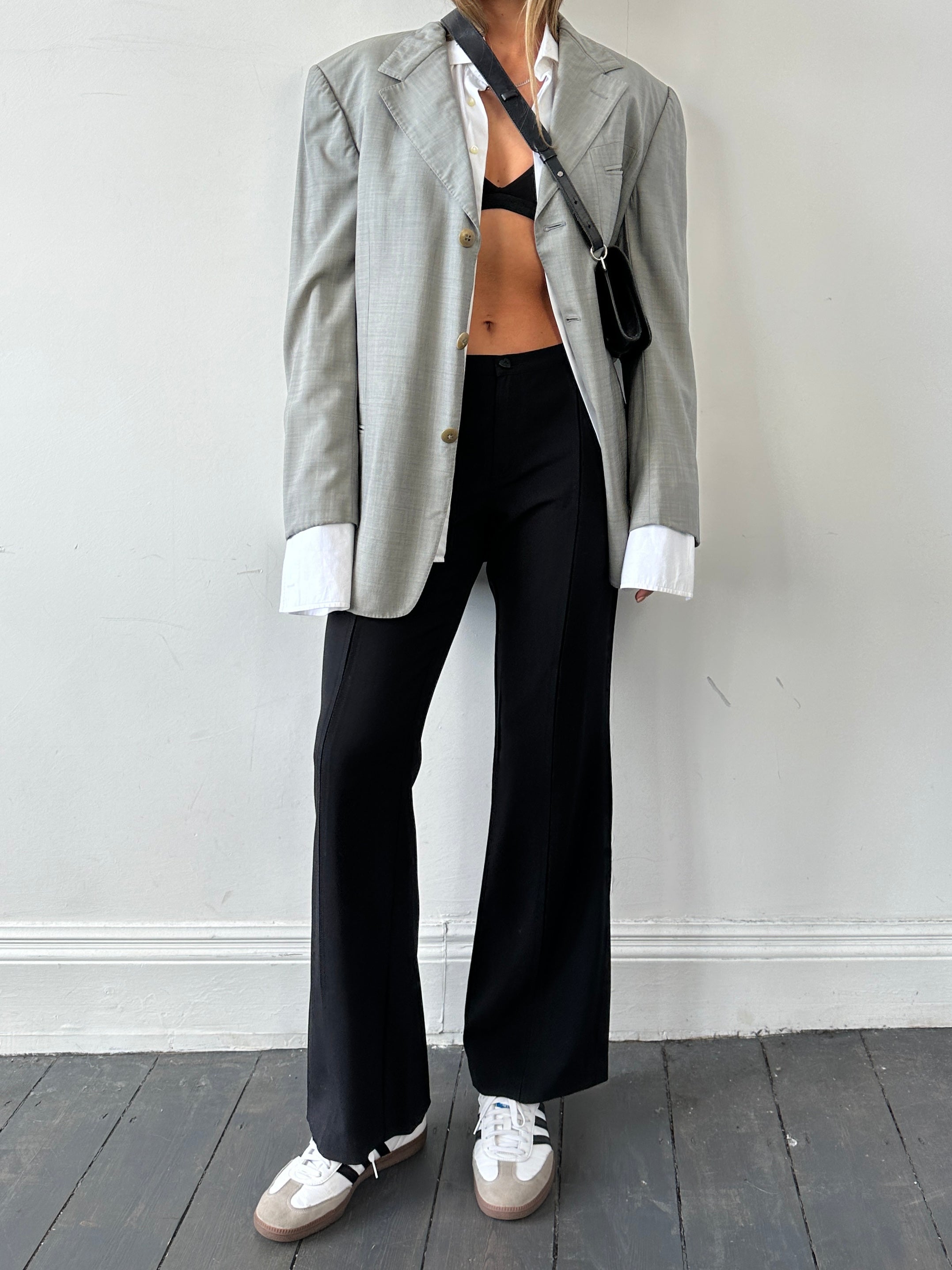 Moschino low waist flared wool trousers in navy, front view showing classic fit and tailored design, size W34/UK 12.
