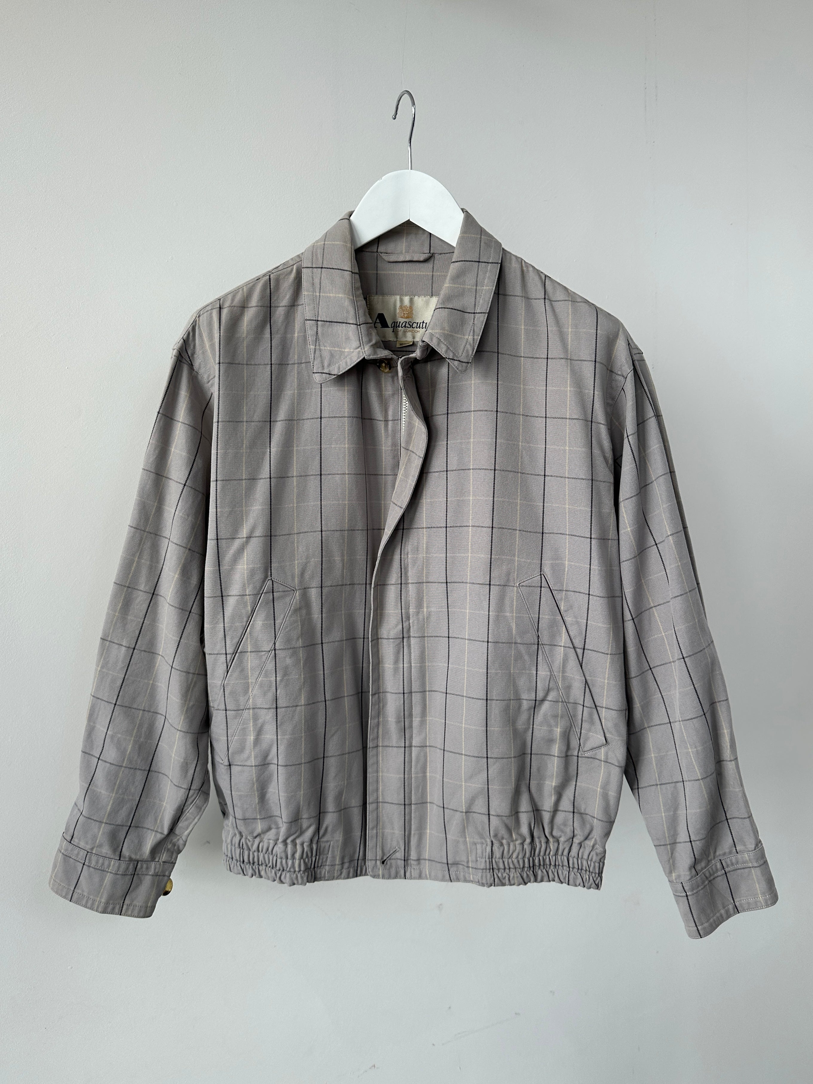 Aquascutum check cotton bomber jacket in size S, featuring a classic patterned design and a casual, stylish fit.