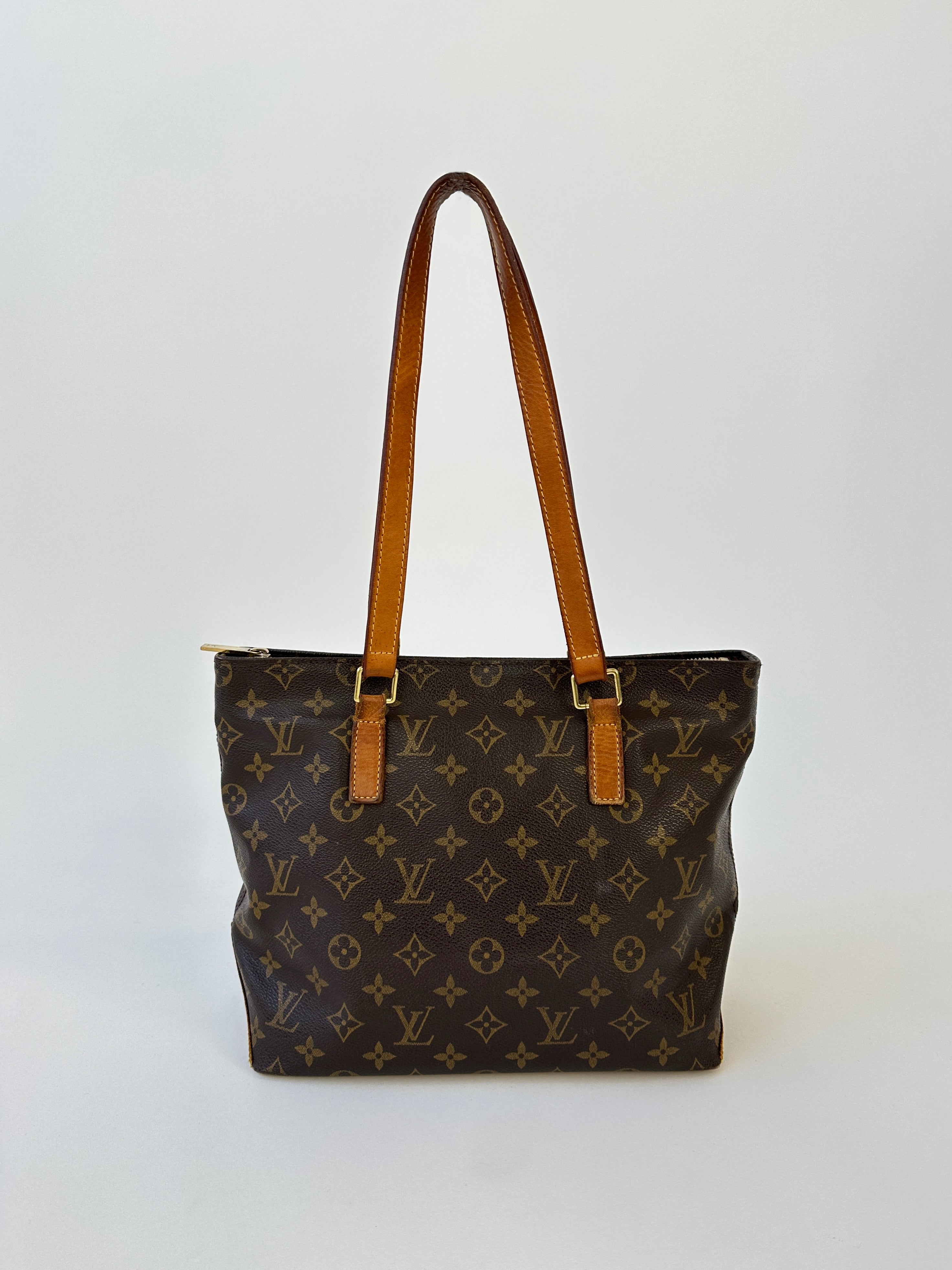 Louis Vuitton 2002 Cabas Mezzo Monogram shoulder bag with leather handles and spacious interior, featuring classic LV monogram pattern.