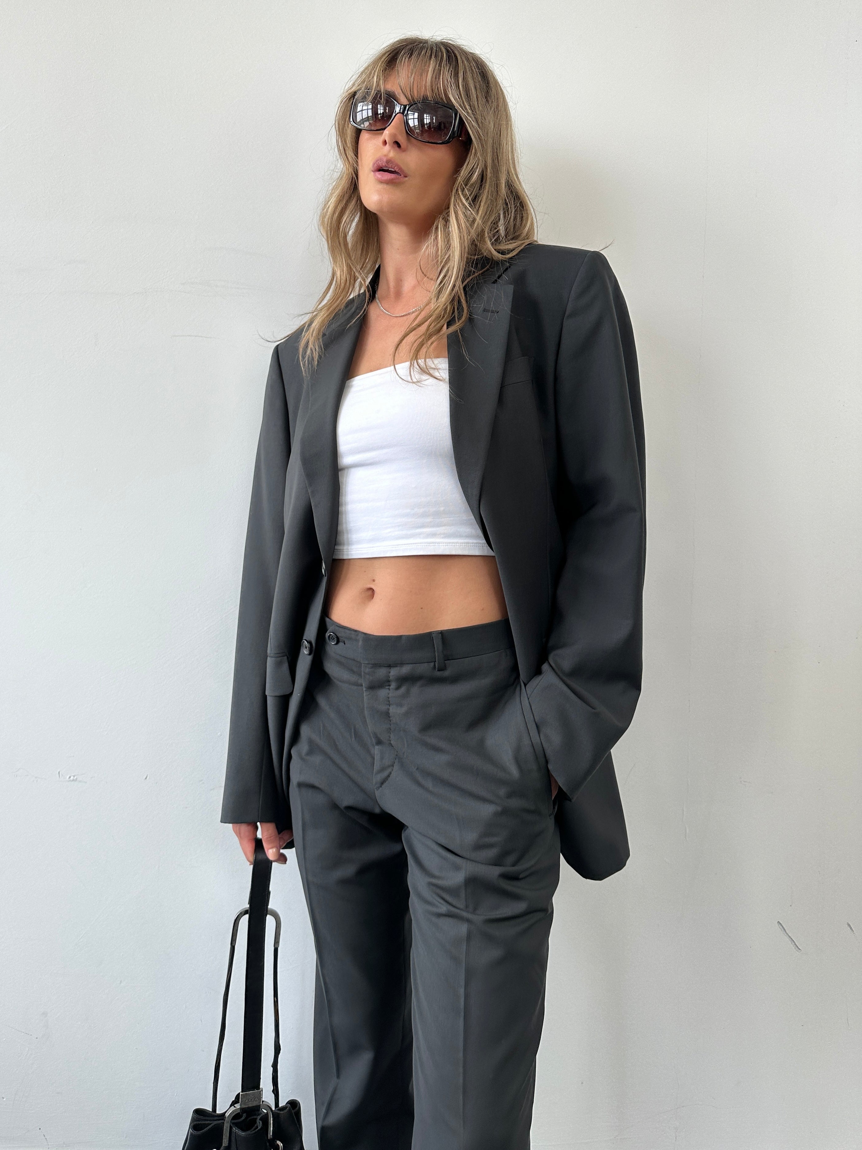 Prada mohair wool single-breasted jumpsuit, size 42R/W32, in a stylish tailored design with lapel collar and front buttons.