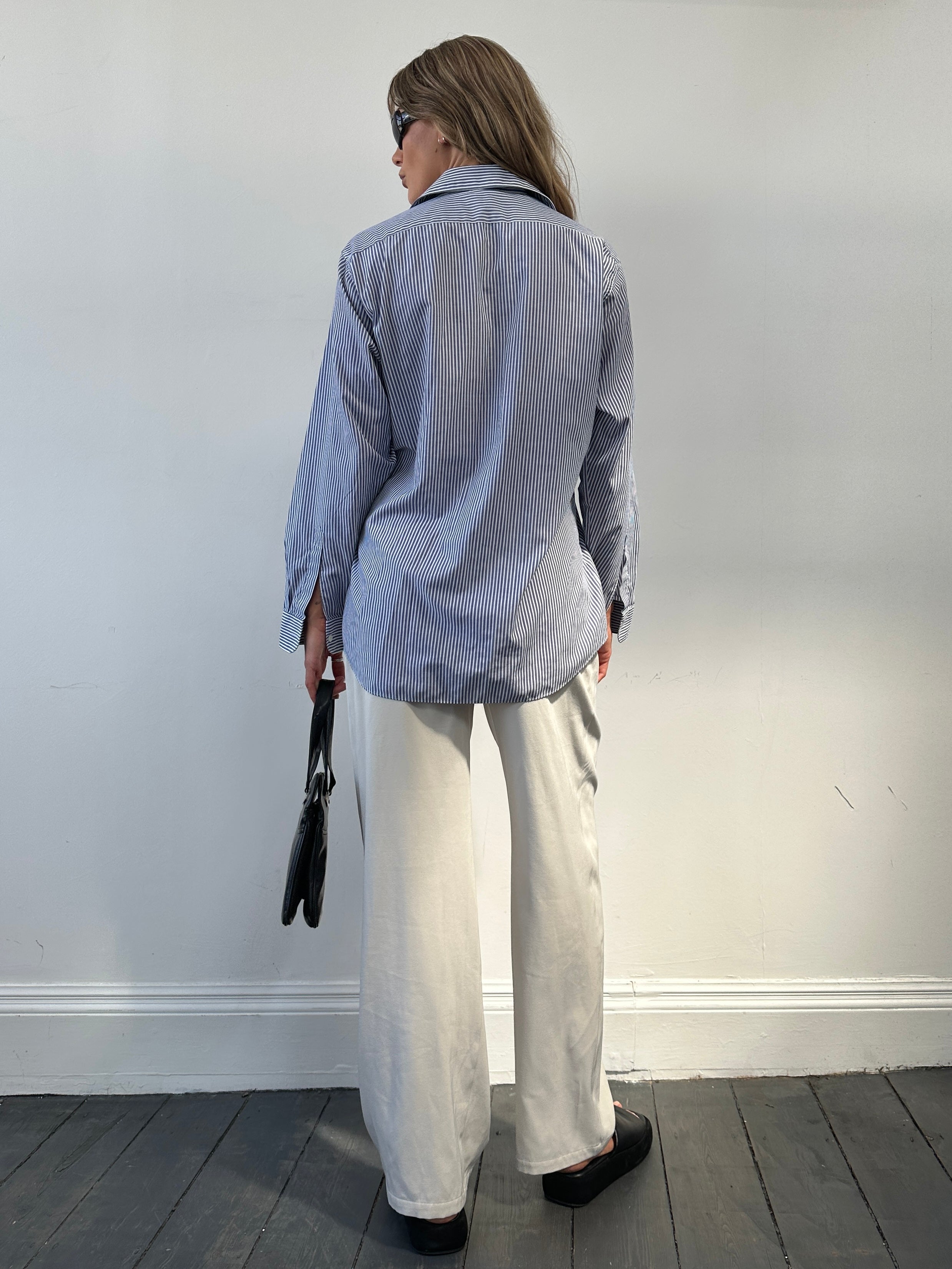 St Michael pinstripe cotton shirt in size M with a classic collar and button-down front, displayed on a hanger.