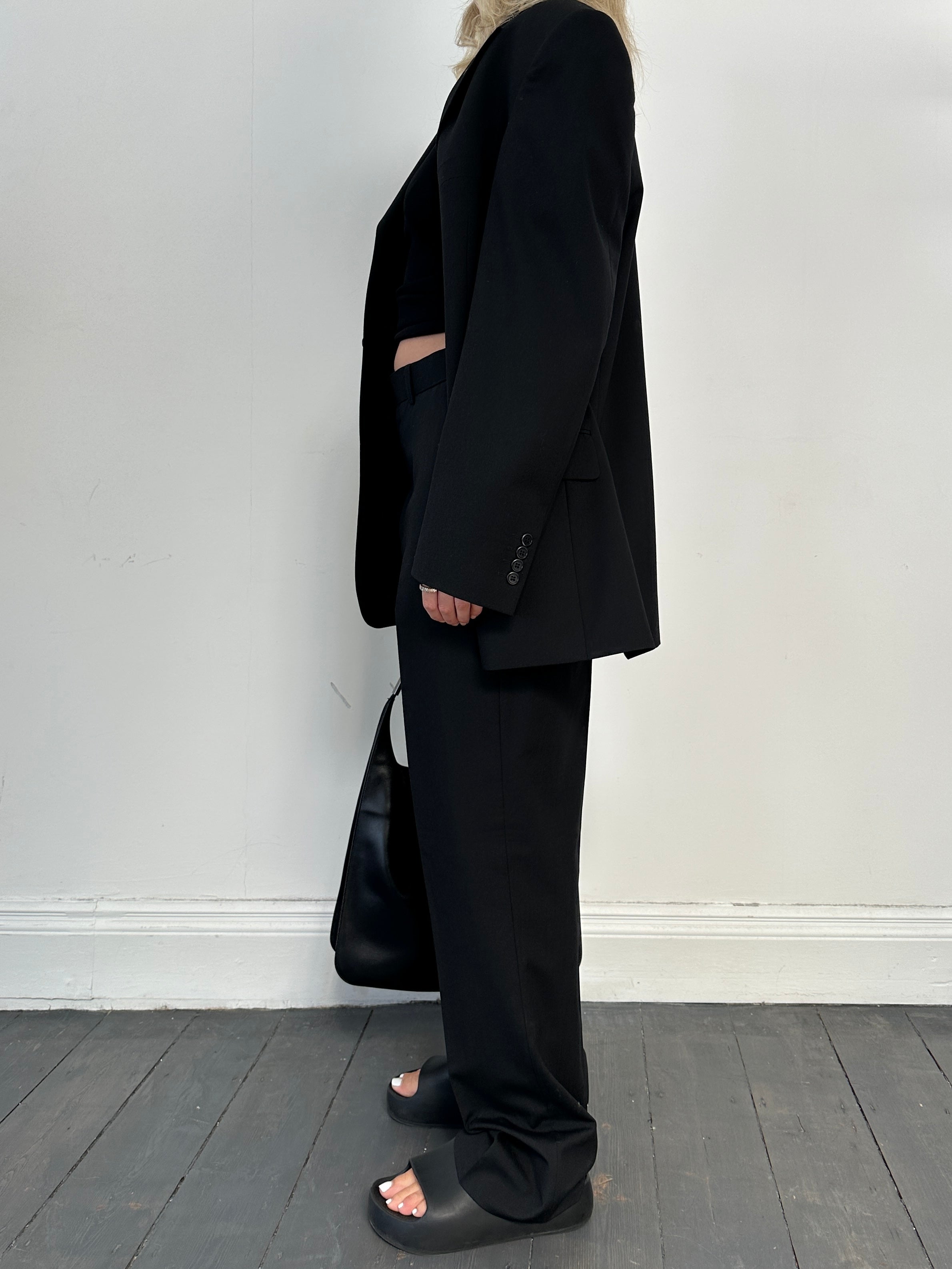 Vintage single-breasted wool blend suit jumpsuit in size 42R/W36, featuring classic tailored design and structured fit.