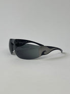 Prada Flame Rimless Wrap Sunglasses - SYLK