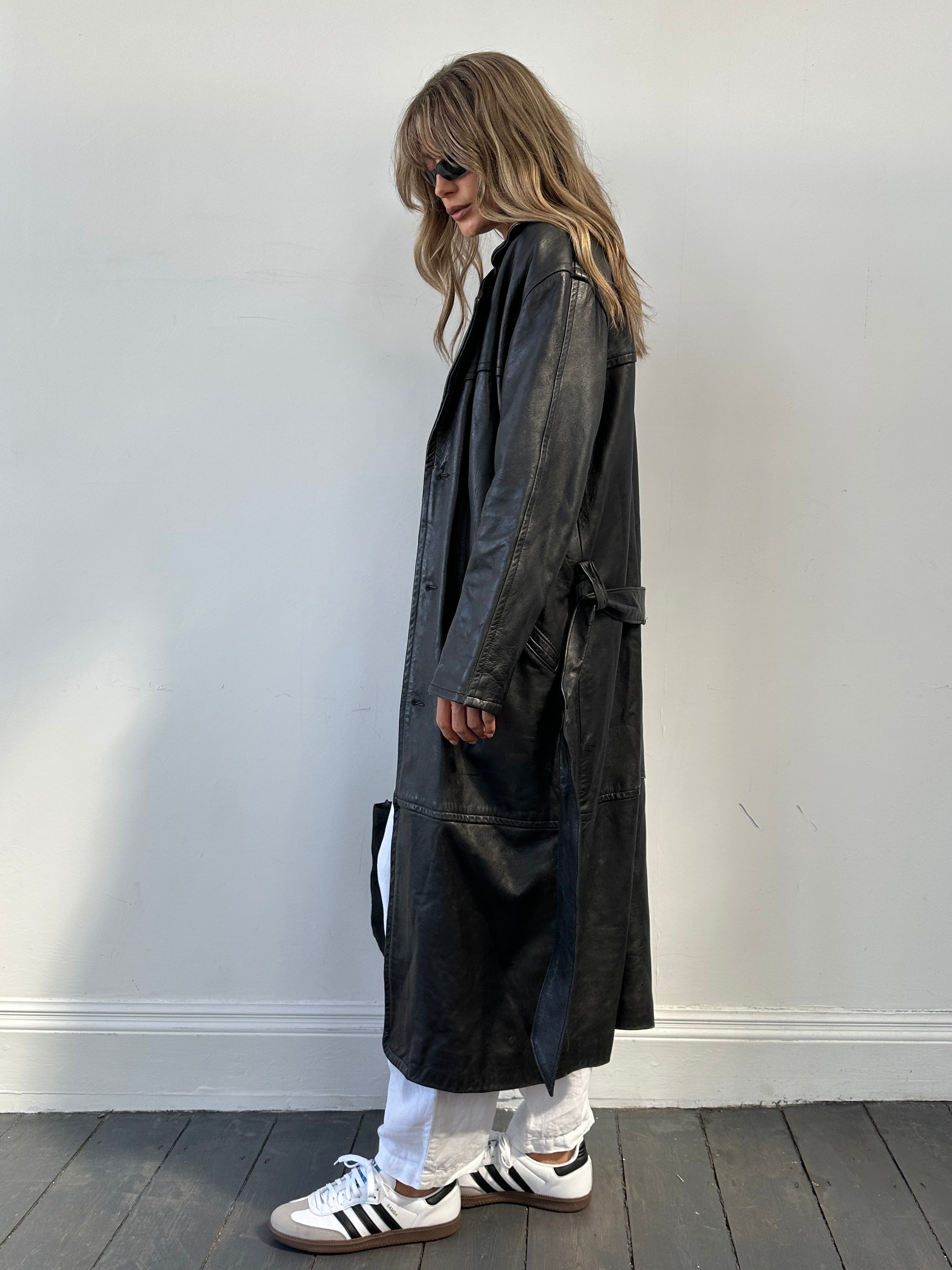Vintage belted leather floor-length coat, women's jacket with classic design and natural leather texture, size M.