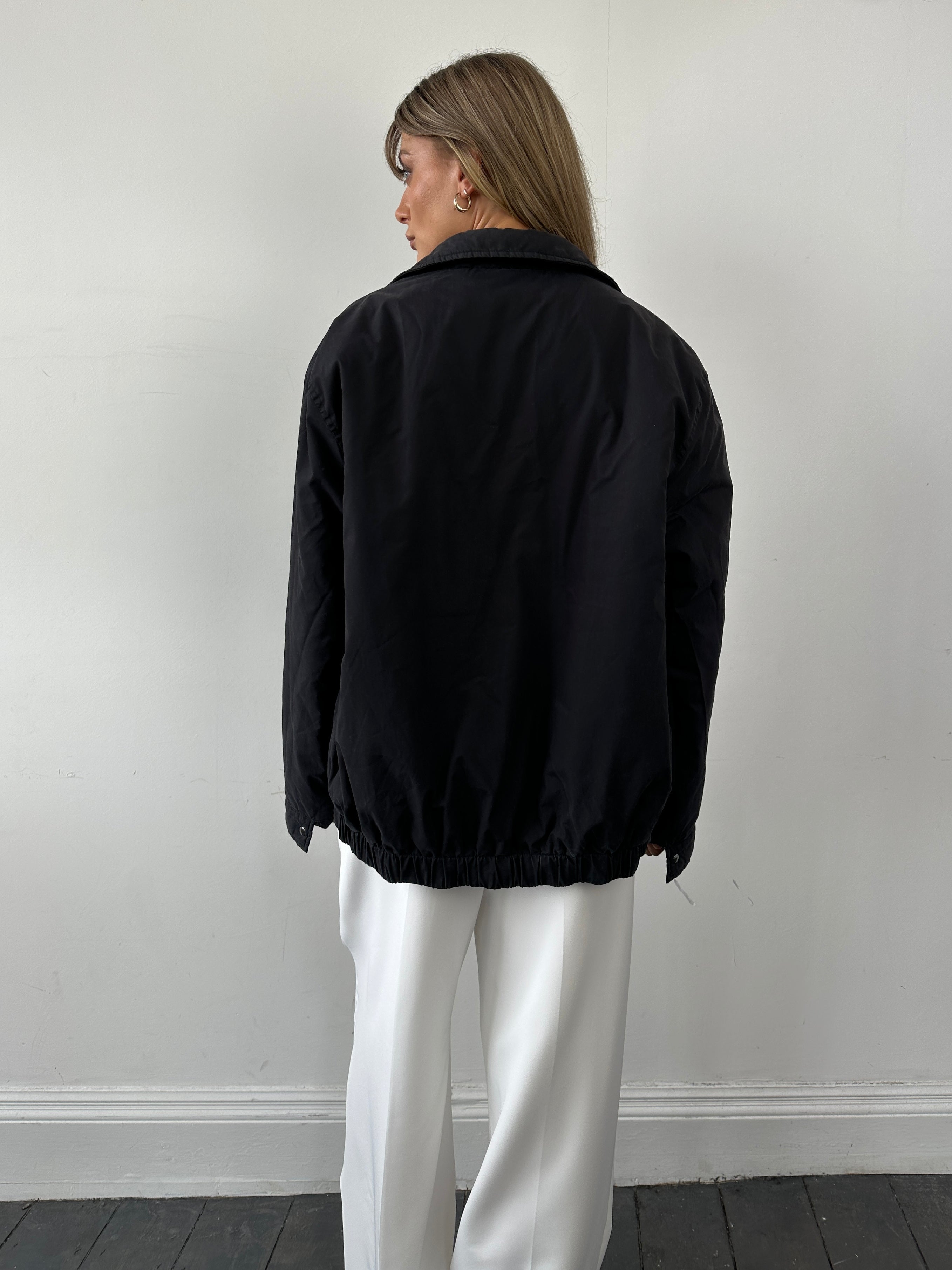 Yves Saint Laurent Pour Homme logo padded bomber jacket in XL, featuring a sleek design with logo branding and quilted padding.