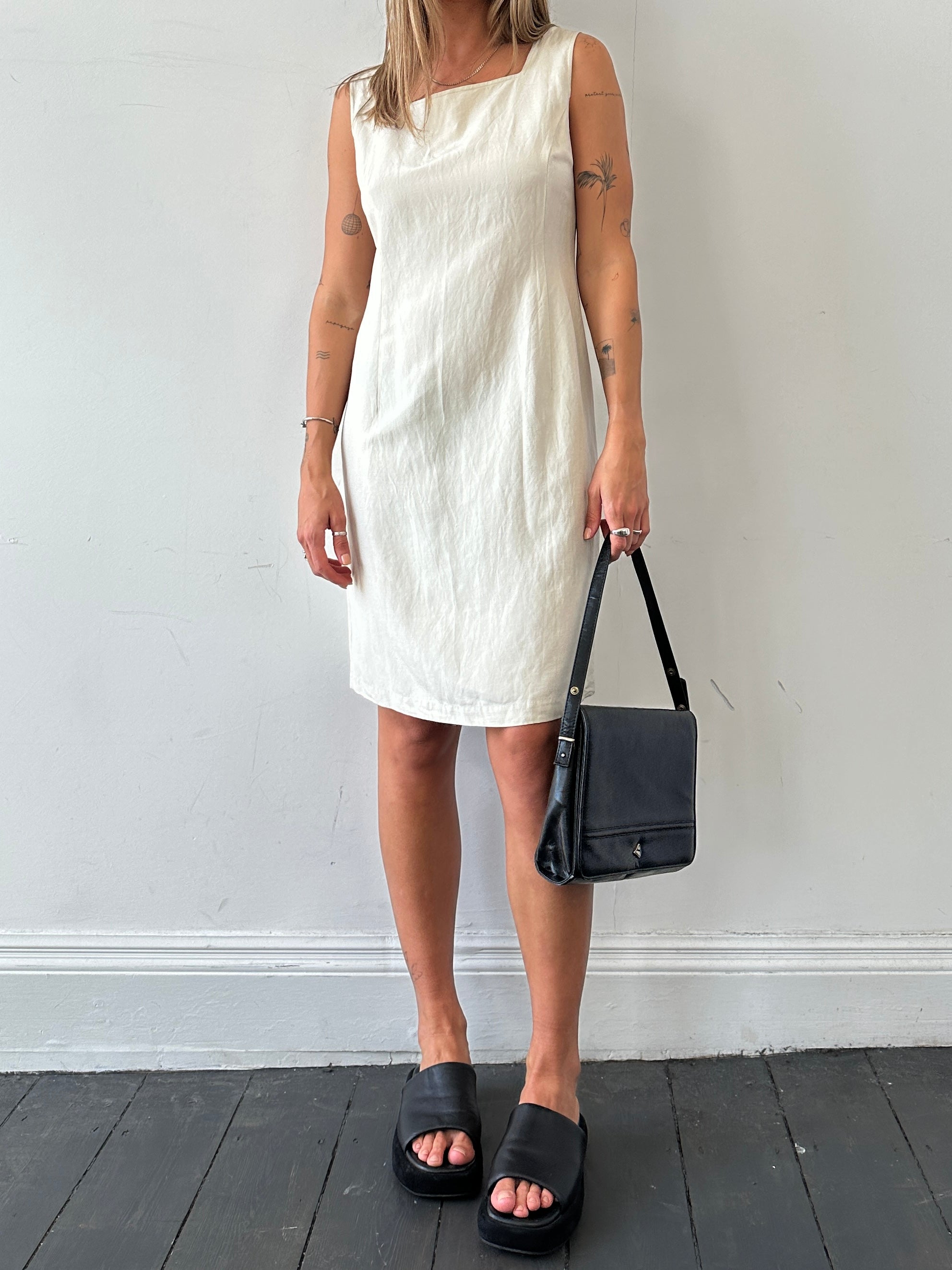 Laura Ashley silk linen square neck midi dress in M, shown in a soft, flowing fabric with a stylish midi length and elegant design.