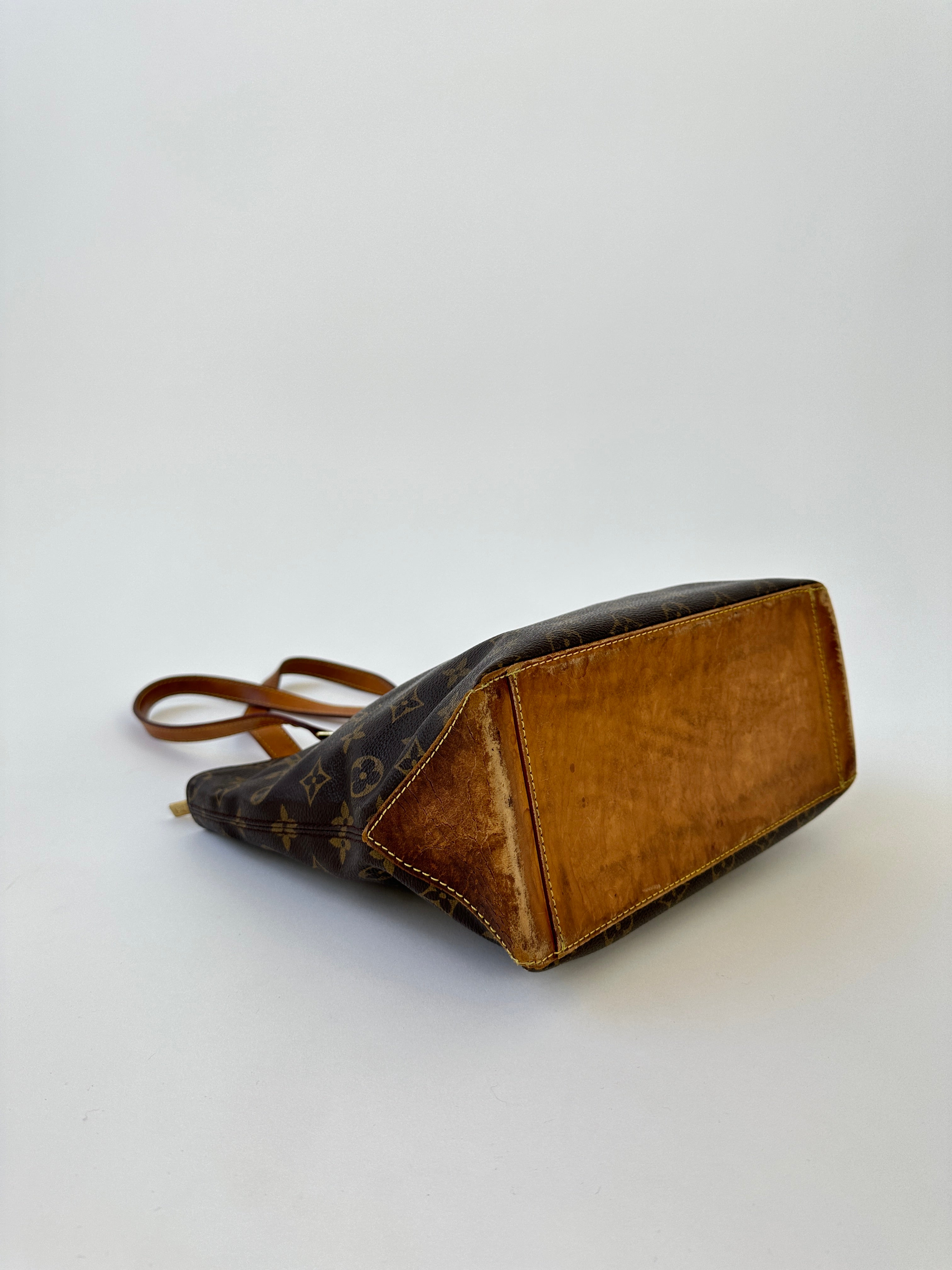 Louis Vuitton 2002 Cabas Mezzo Monogram shoulder bag with leather handles and spacious interior, featuring iconic LV monogram canvas.