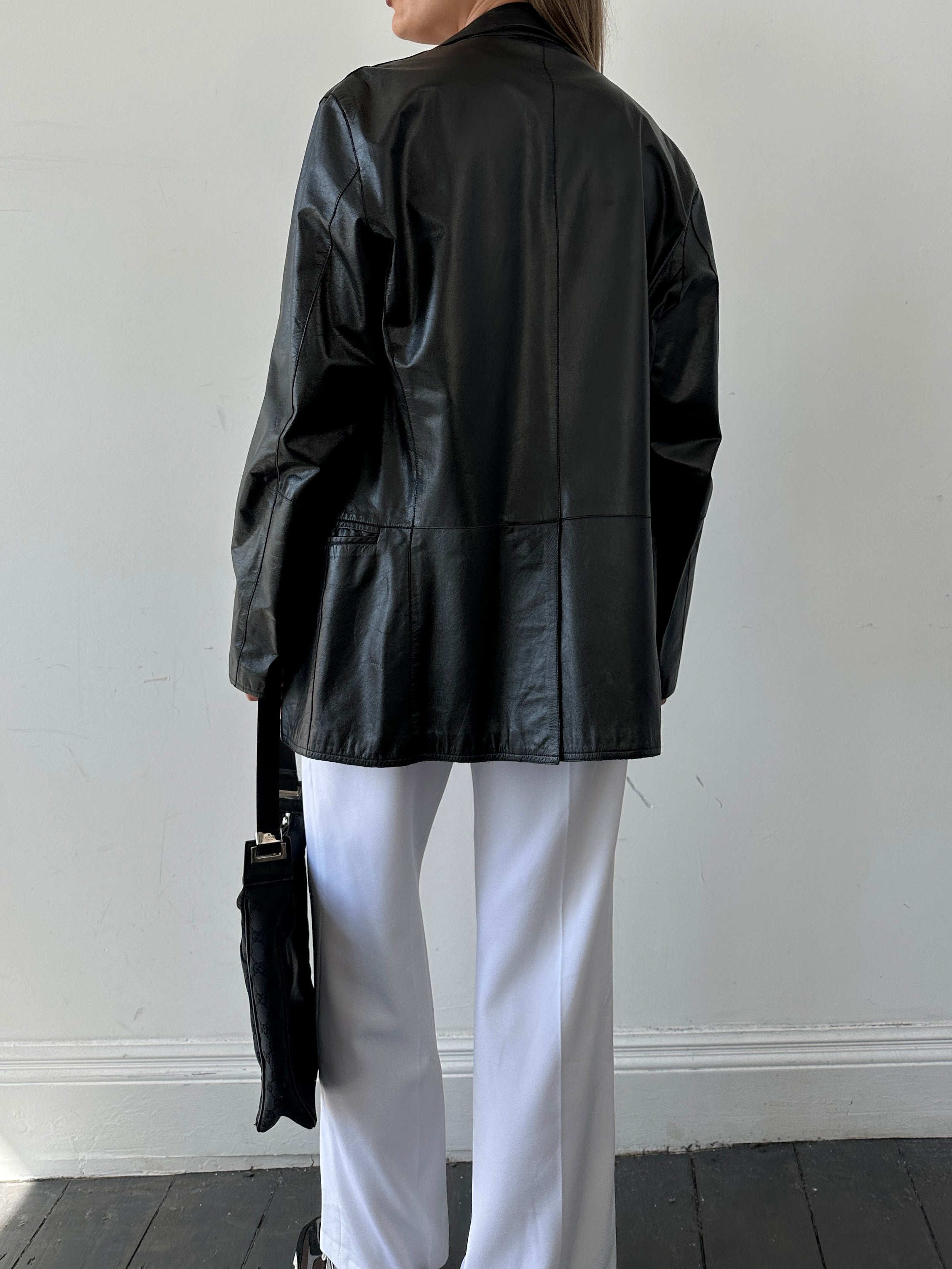 Emporio Armani leather blazer jacket in size small, featuring a sleek design with smooth leather and classic tailoring.