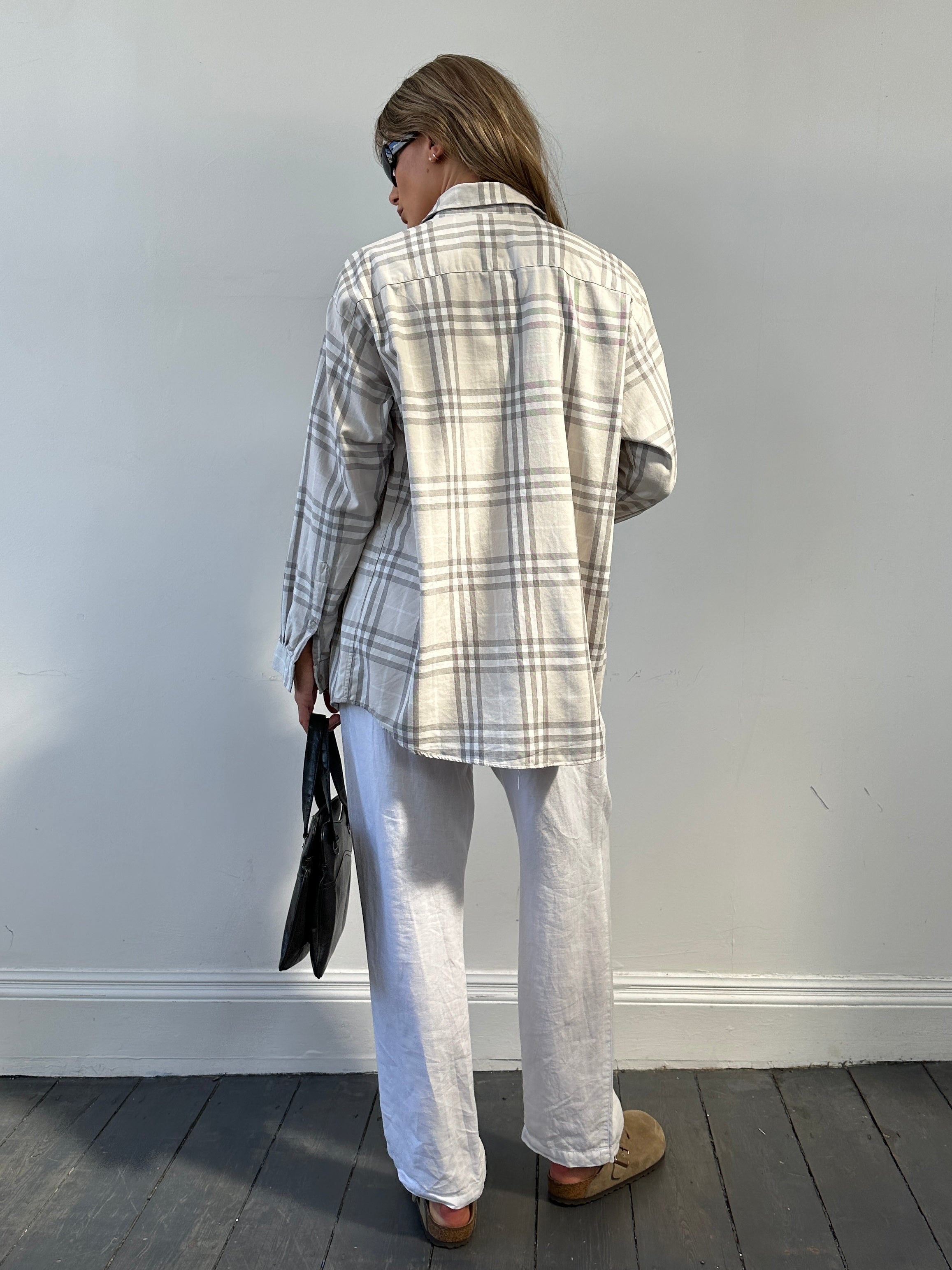 Burberry London Check cotton shirt in size L, featuring signature plaid pattern and classic collar, displayed on a neutral background.