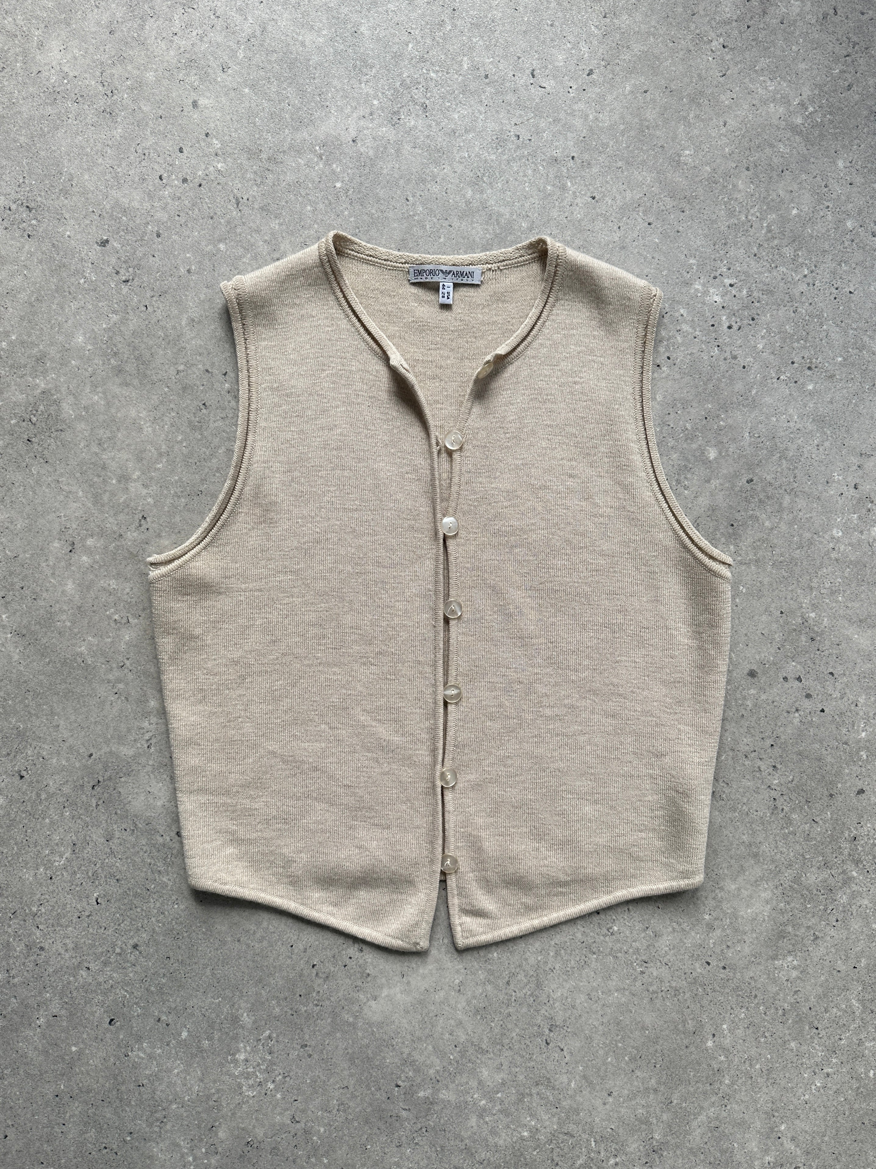 Emporio Armani pure wool knit waistcoat in beige, showing detailed front view with V-neck and button closure.