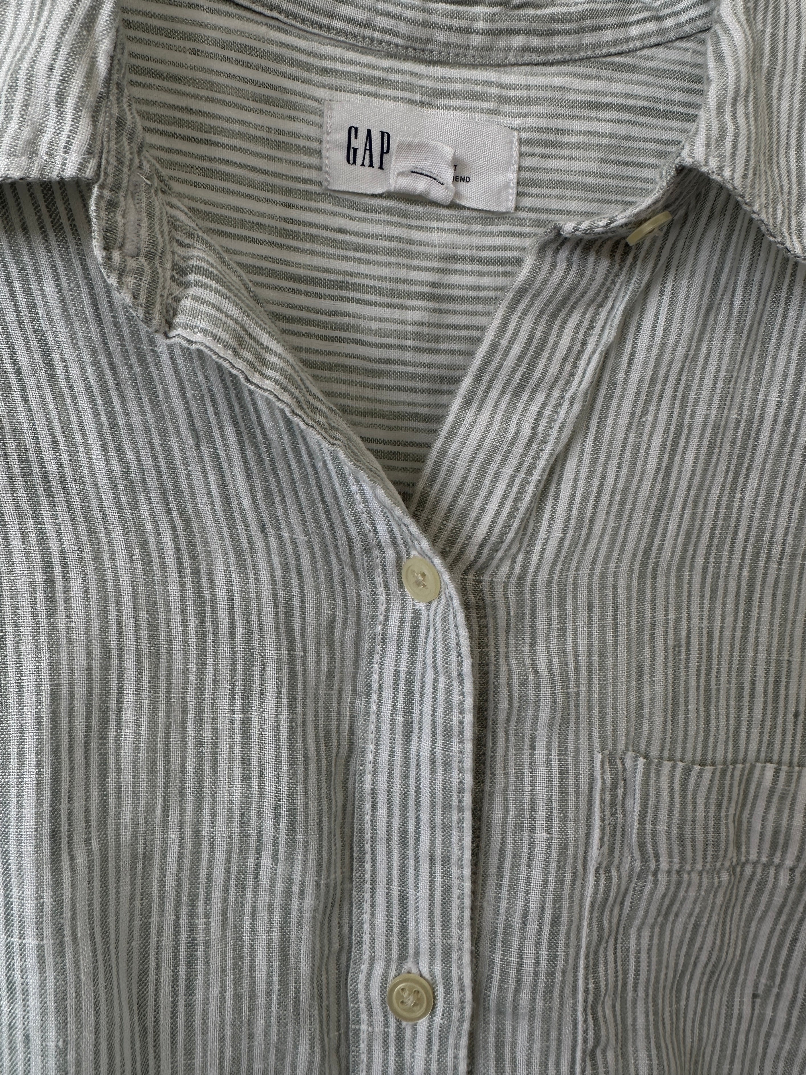 GAP pinstripe linen shirt in size M, featuring a classic collar, button front, and lightweight breathable fabric.