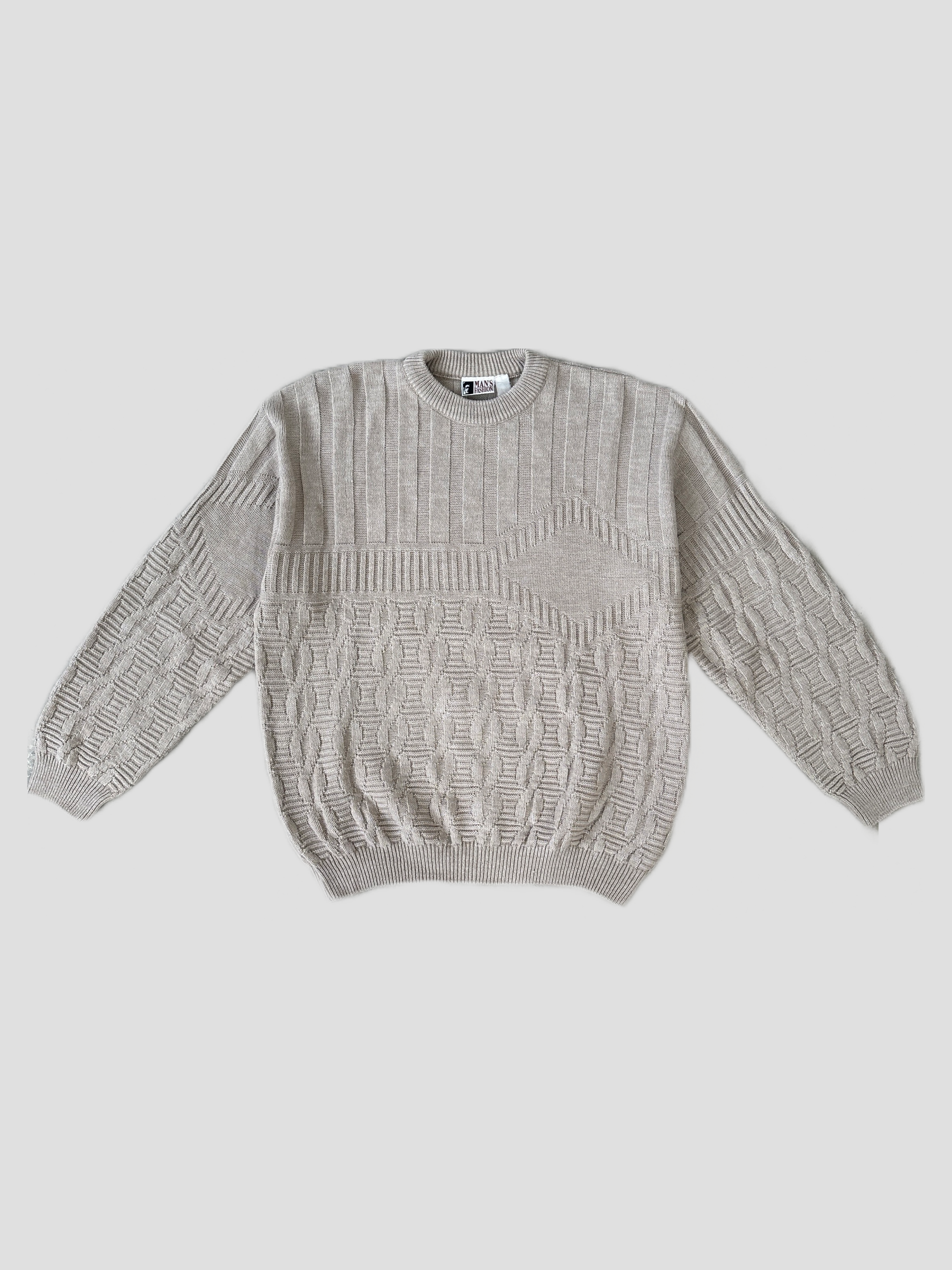 Vintage knitted wool jumper in size L, featuring a cozy, textured design perfect for casual wear.