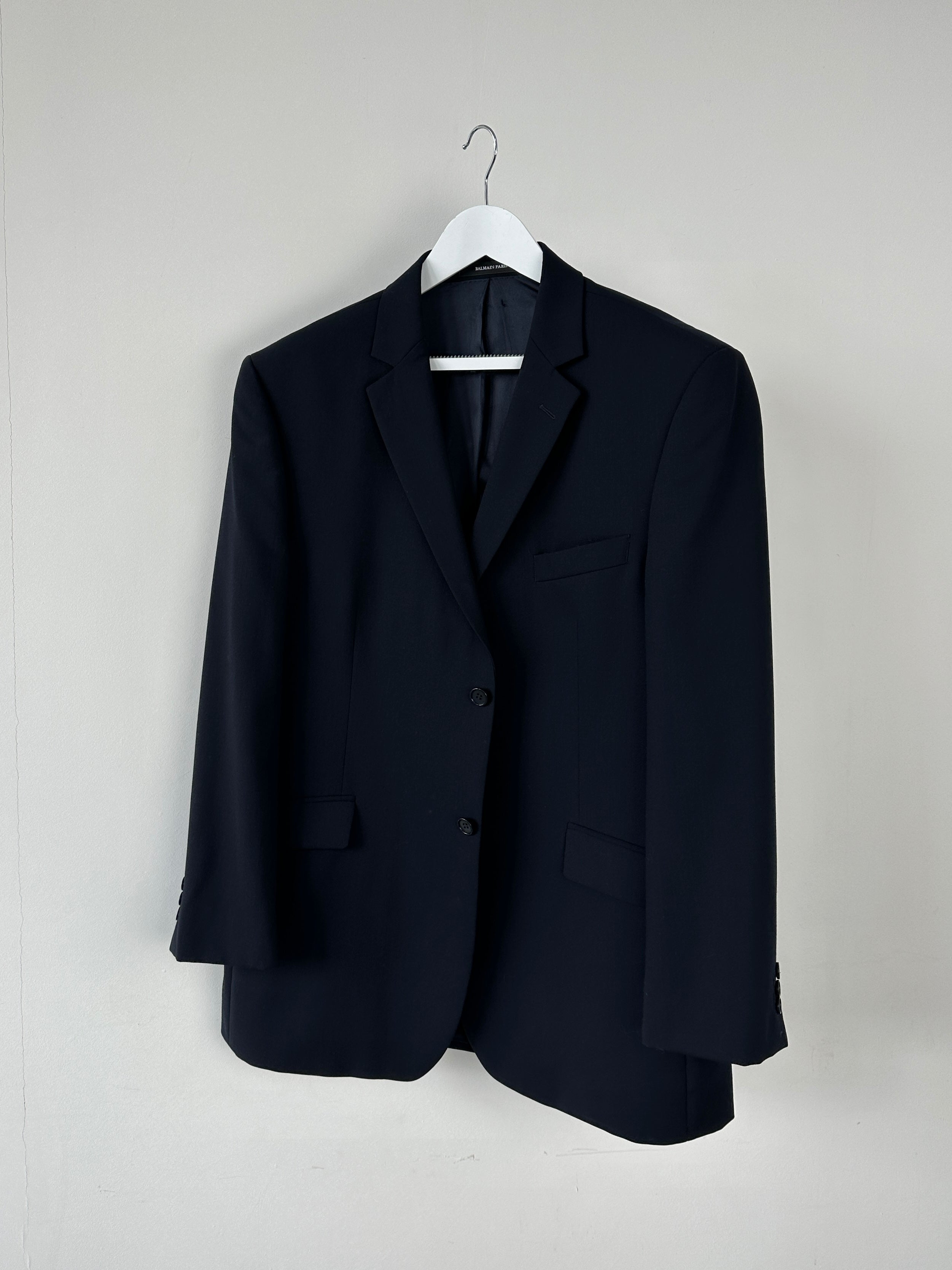 Balmain Paris single-breasted wool blazer in size 44R/L, tailored fit with classic lapels and structured design.