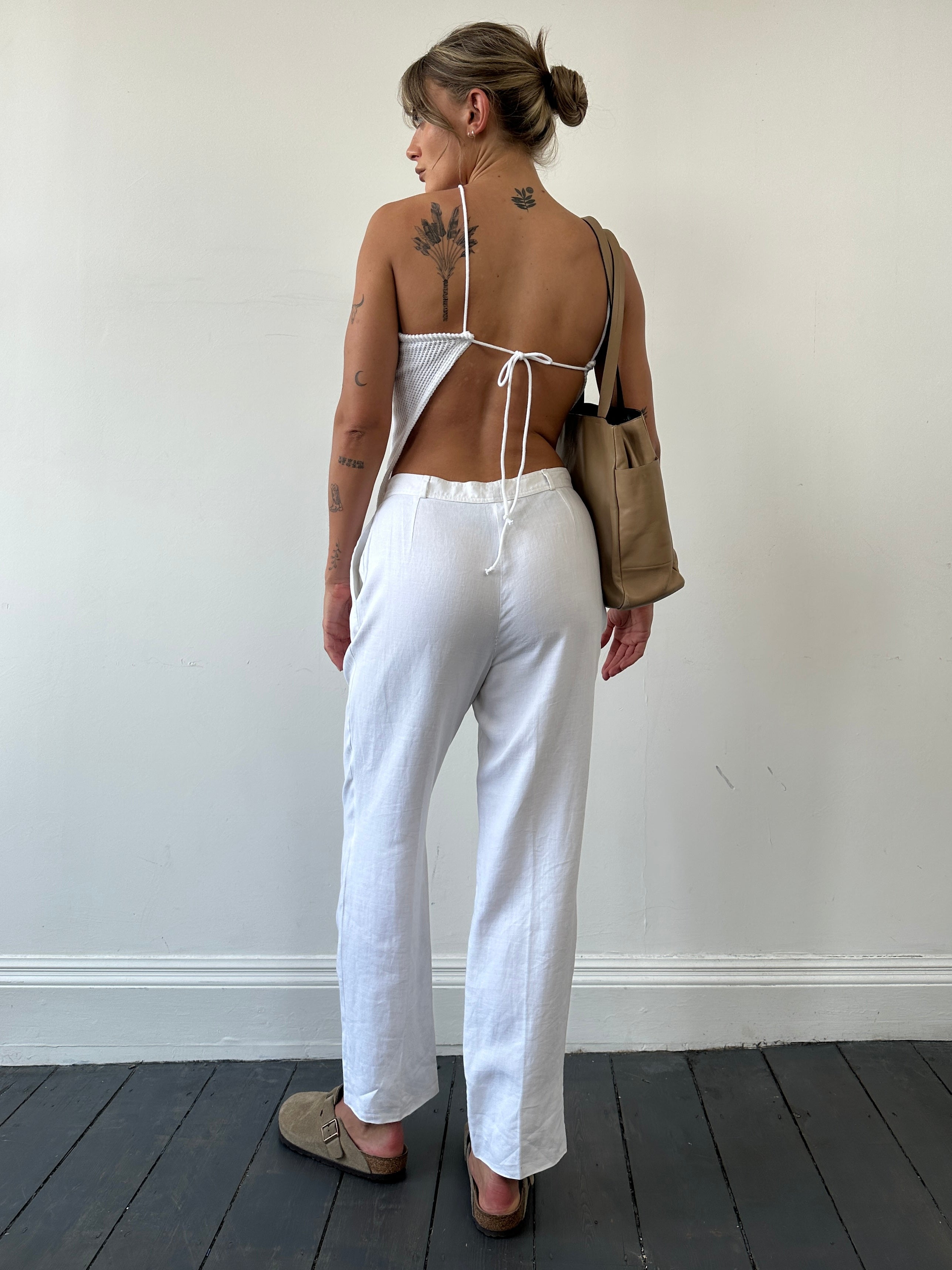 Valentino Miss V Pure Linen High-Waisted Trousers in light fabric with a tailored fit and classic design.