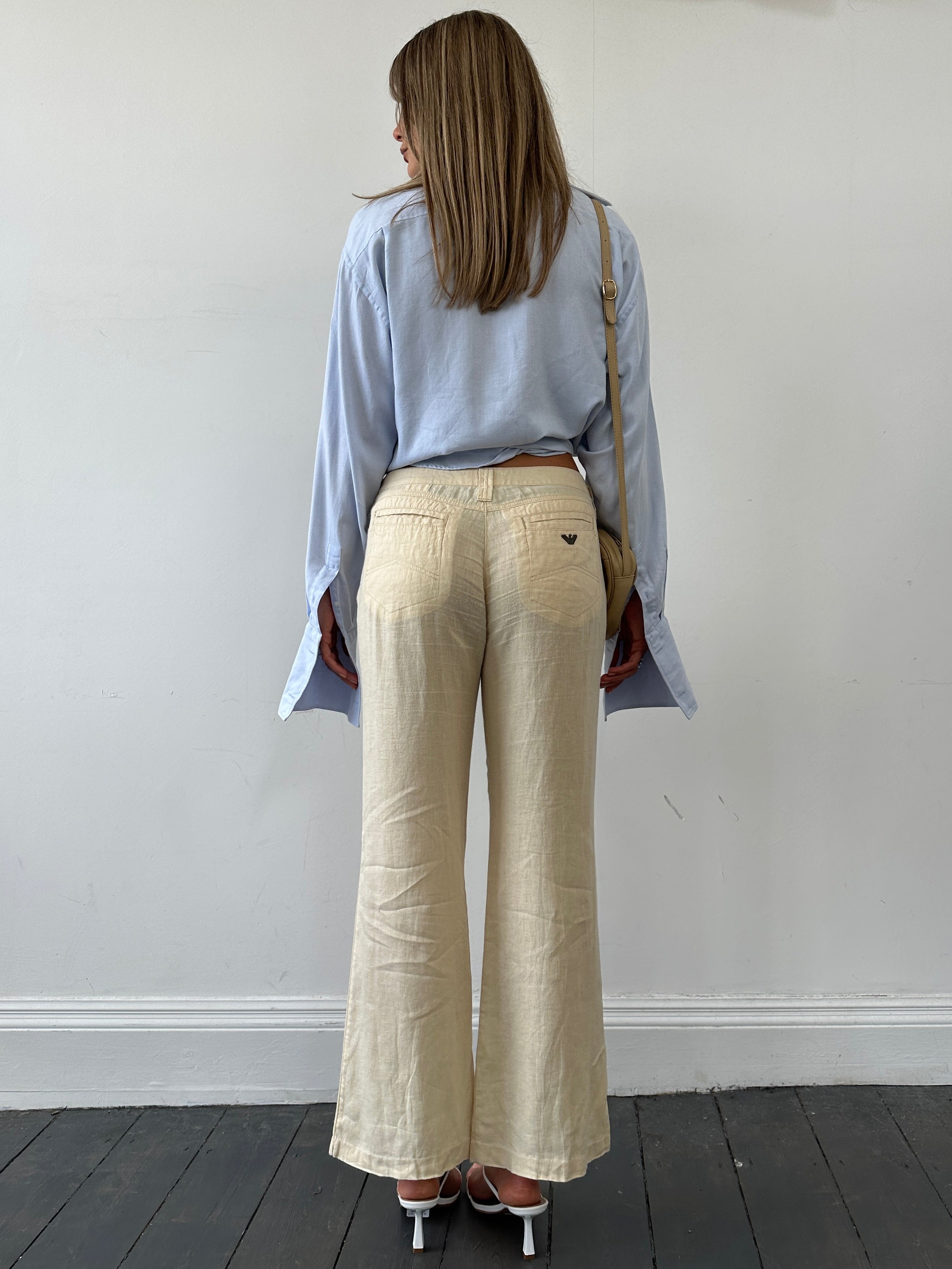 Armani Jeans low rise pure linen flared trousers in W29, showing the lightweight fabric and stylish fit.