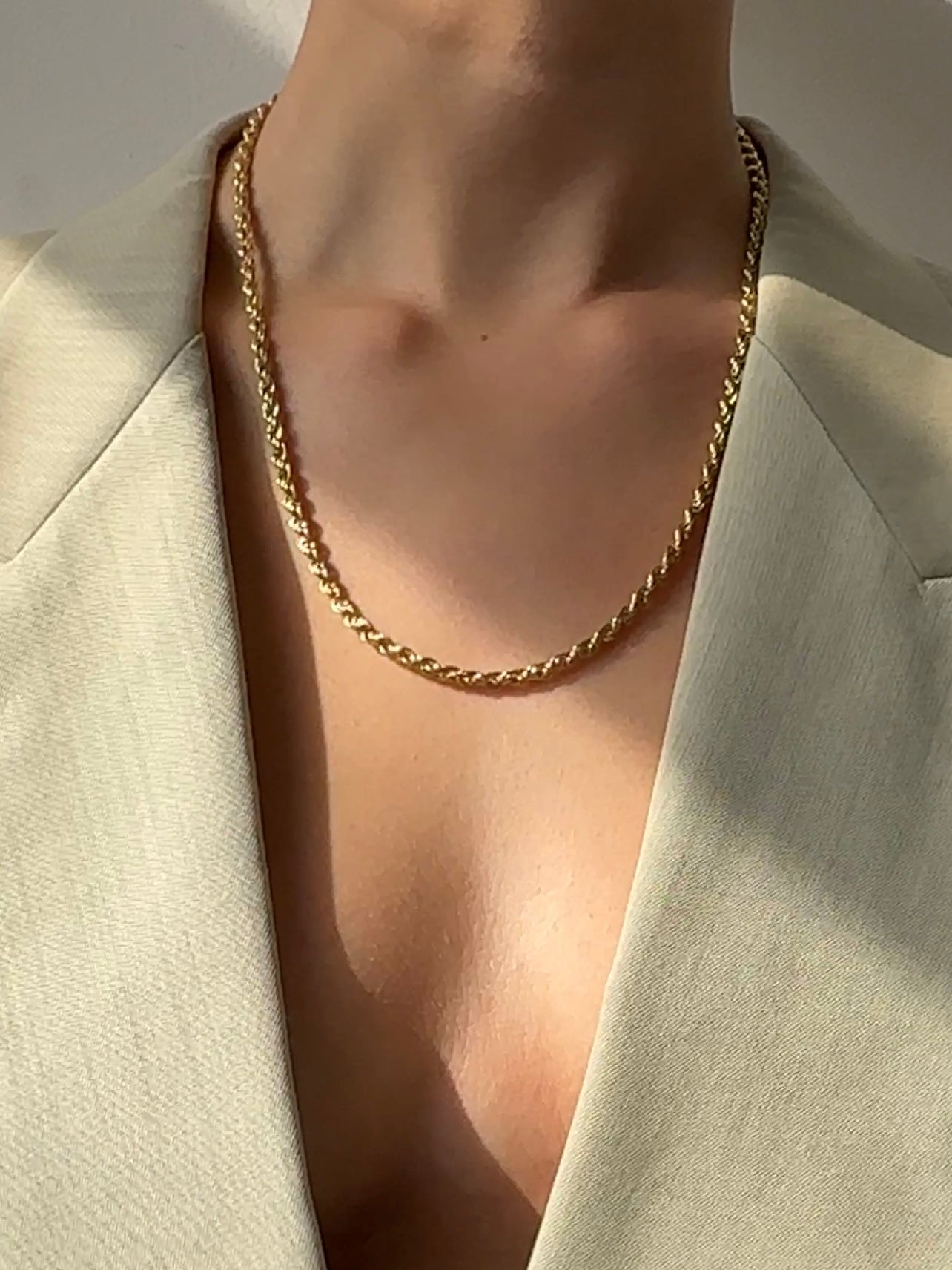 Pierre Cardin gold plated necklace and bracelet chain set with sleek, stylish links visible in the image.