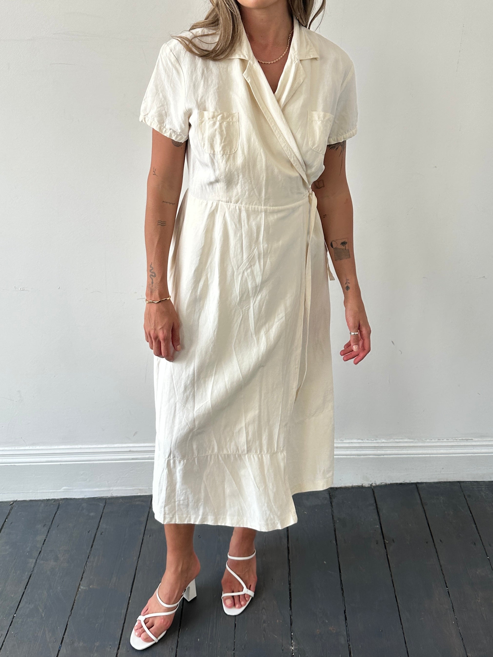 Laura Ashley silk linen maxi wrap dress in S/M, flowing fabric with a stylish wrap design, perfect for elegant occasions.