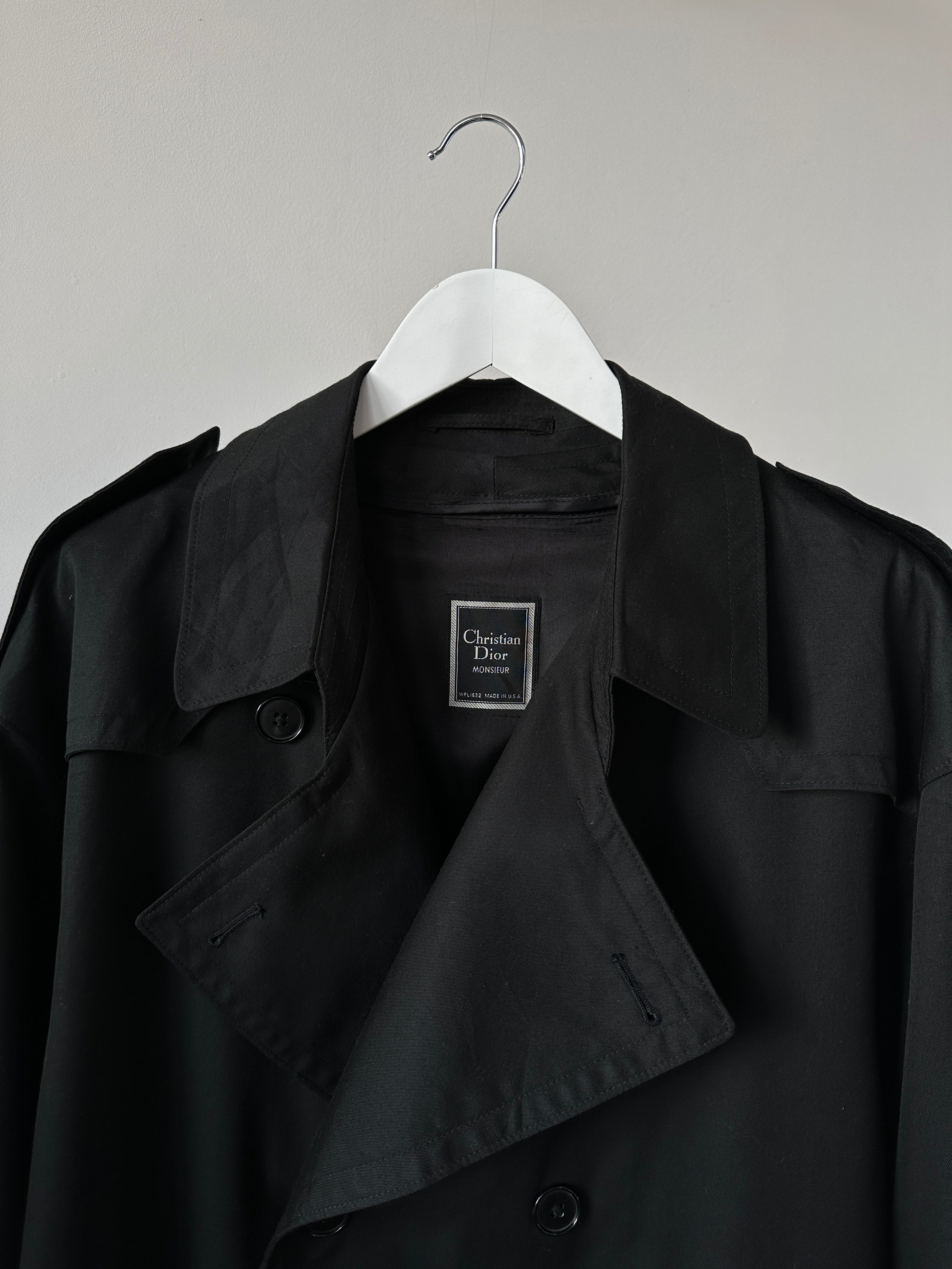 Christian Dior Monsieur double-breasted trench coat in beige fabric, front view showing classic style and tailored fit.