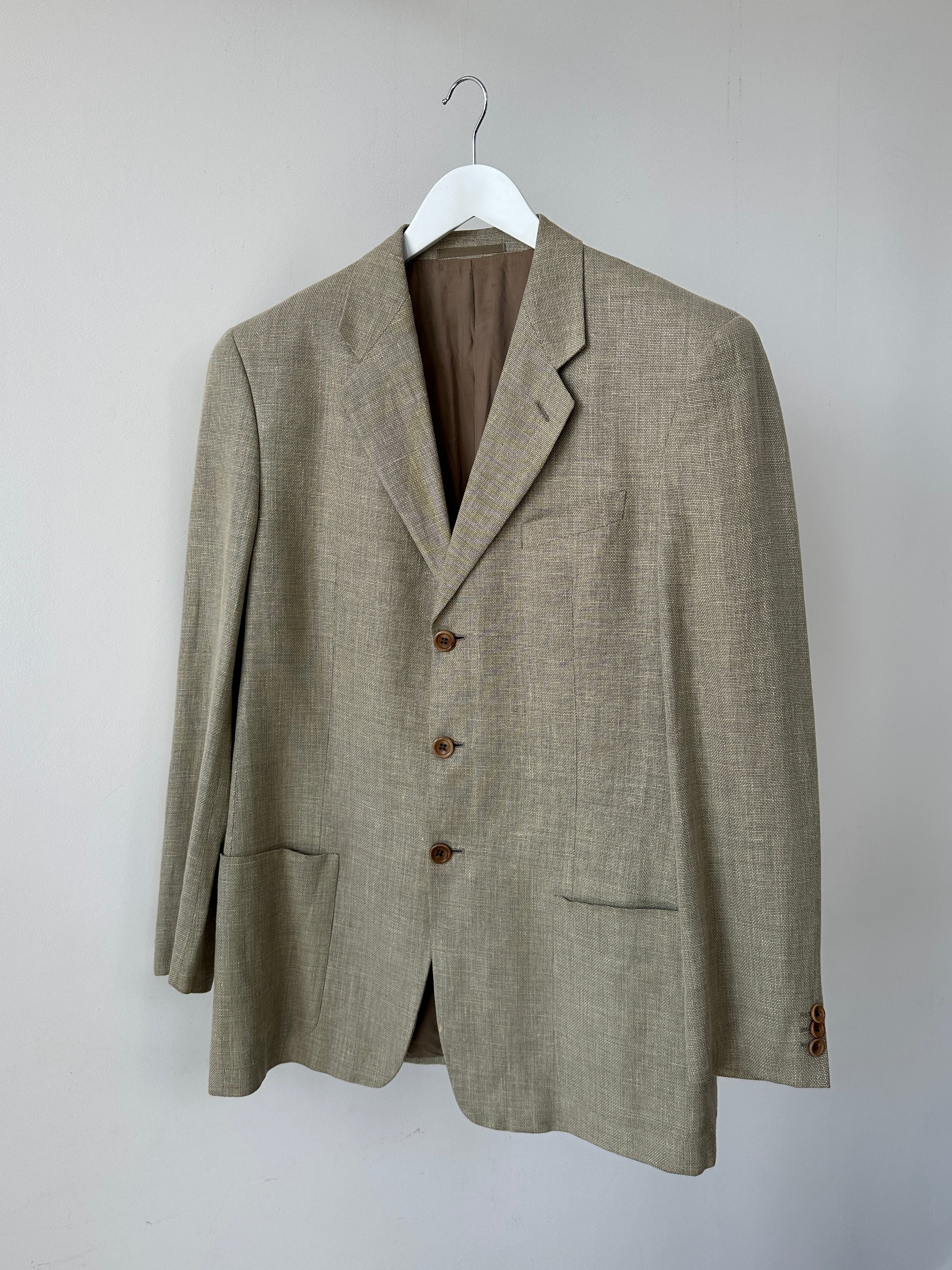Armani Collezioni linen wool single-breasted blazer in size 42R/L, tailored fit with classic lapel and neutral fabric.