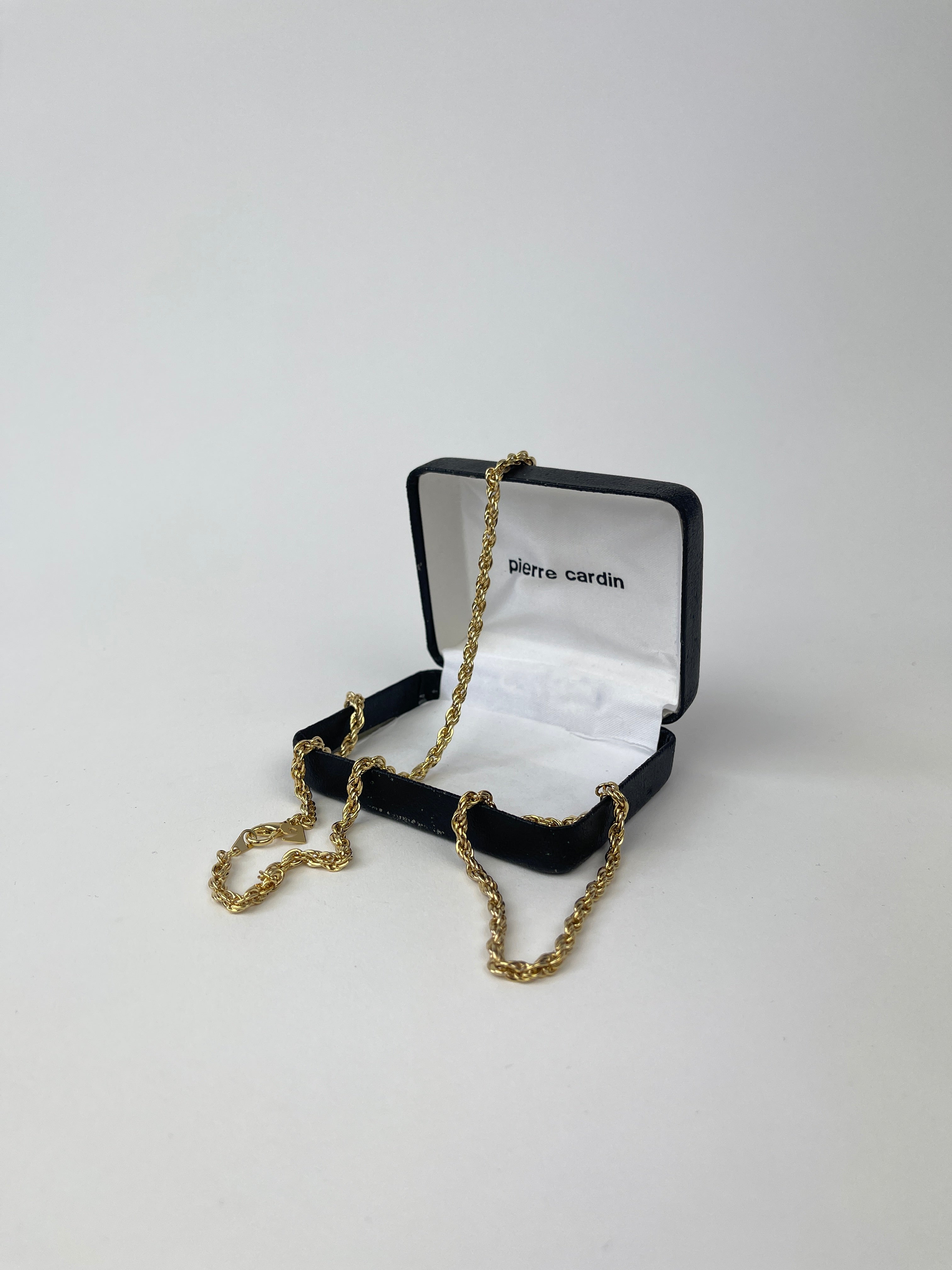 Pierre Cardin gold plated necklace and bracelet chain set displayed on a neutral background.