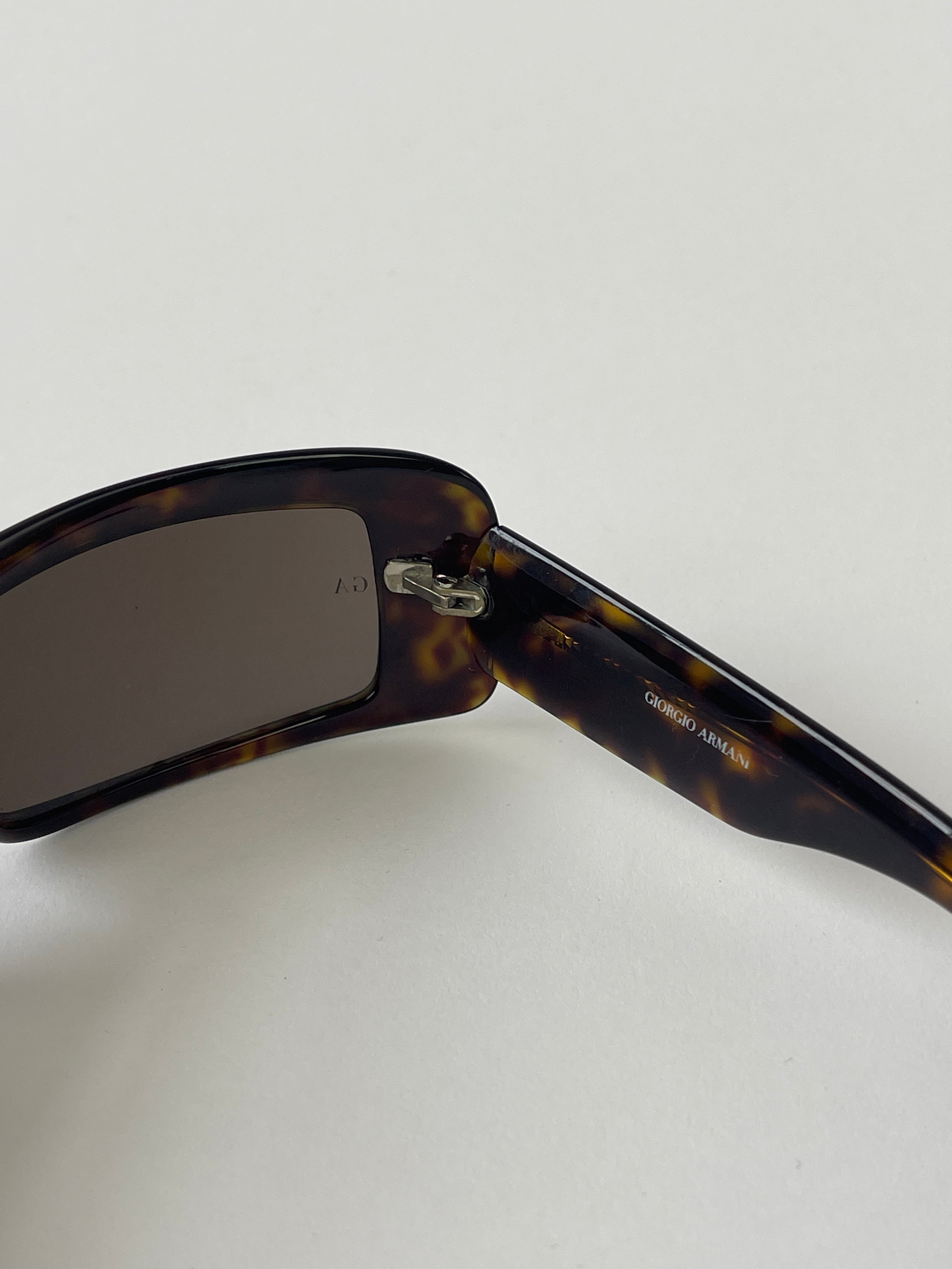 Giorgio Armani rectangle tortoise shell sunglasses with dark tinted lenses and classic frame, stylish and sophisticated eyewear.