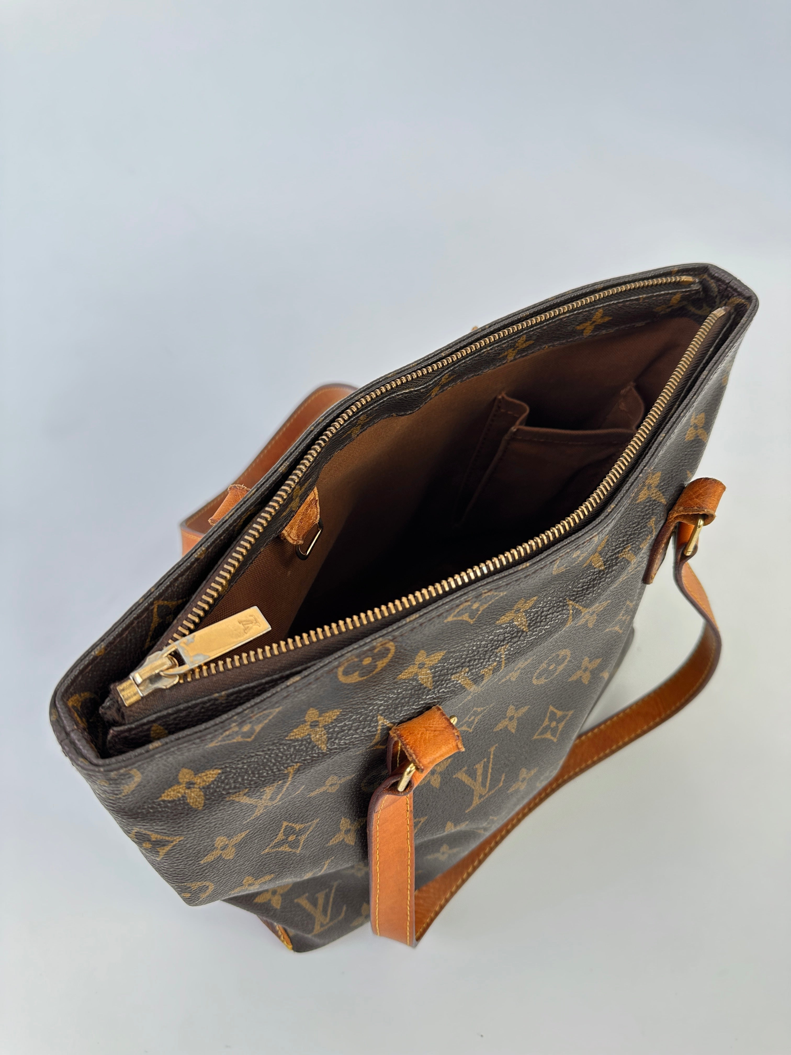 Louis Vuitton 2002 Cabas Mezzo Monogram shoulder bag with leather handles and spacious interior, showcasing classic LV monogram canvas.