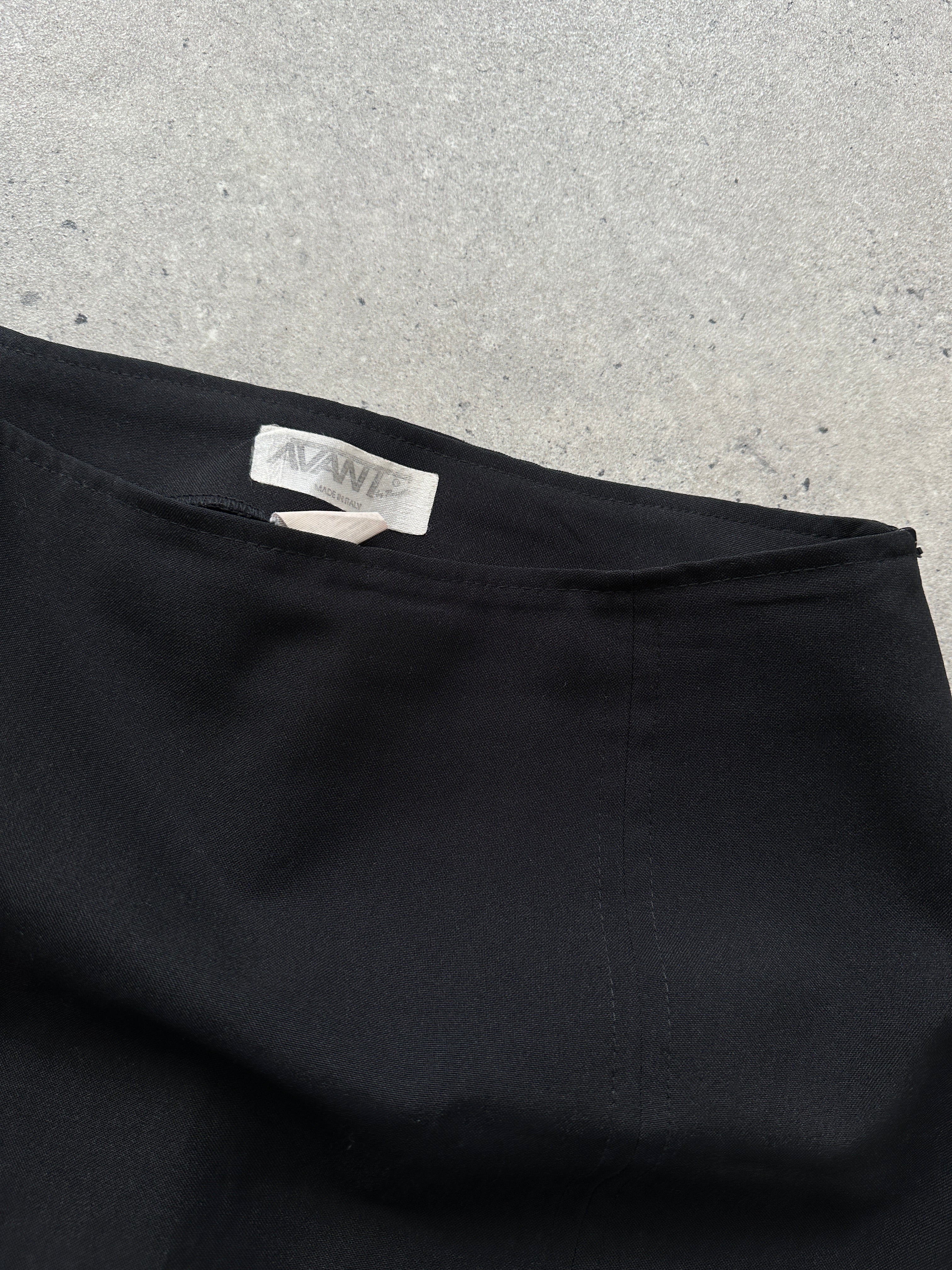 Vintage Italian mini skirt in classic design, featuring a high waist and vintage fabric, shown on a mannequin.