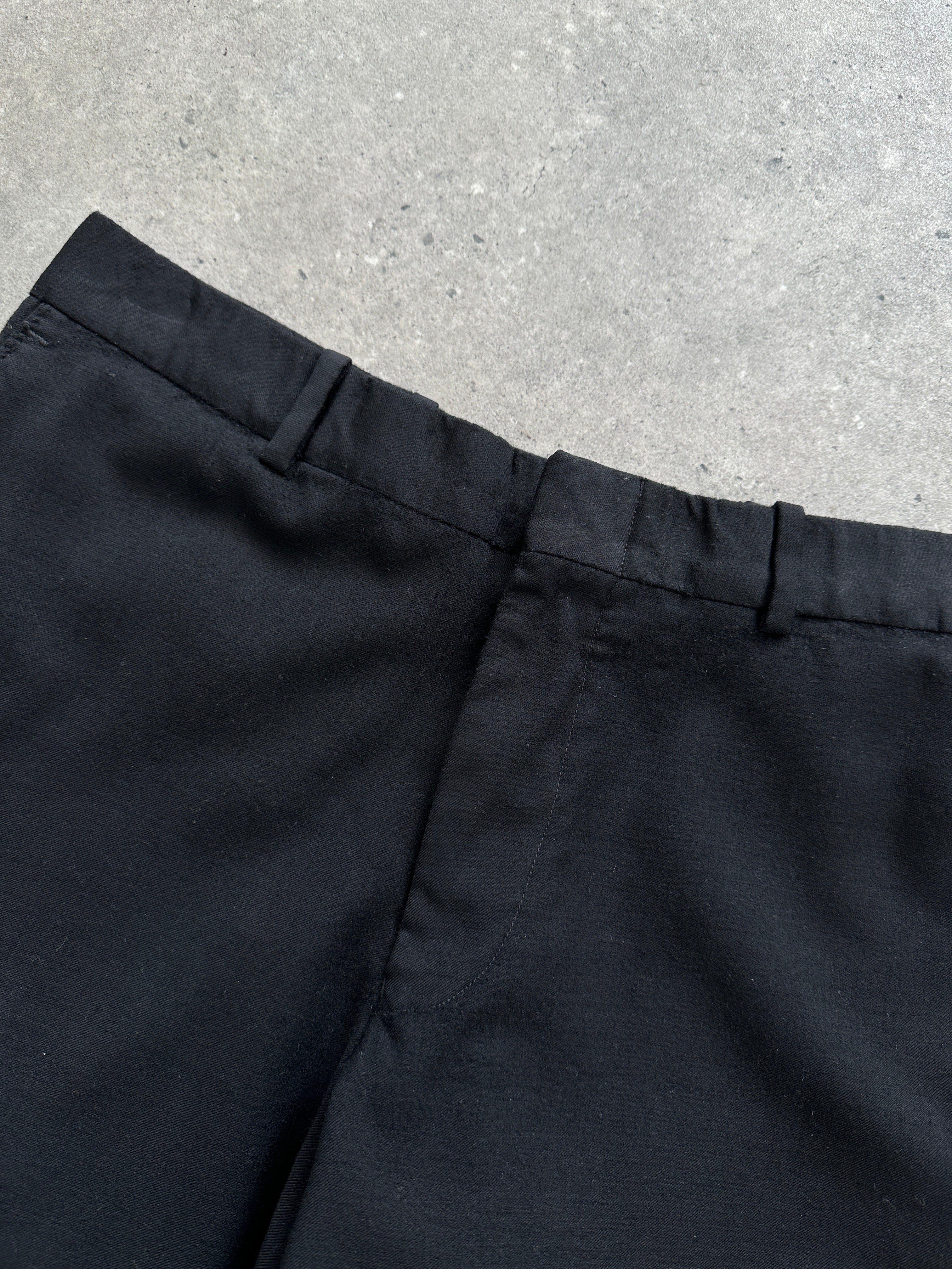 Vintage brand vintage straight leg wool tailored trousers, W30, shown in image with classic fit and neutral color fabric.