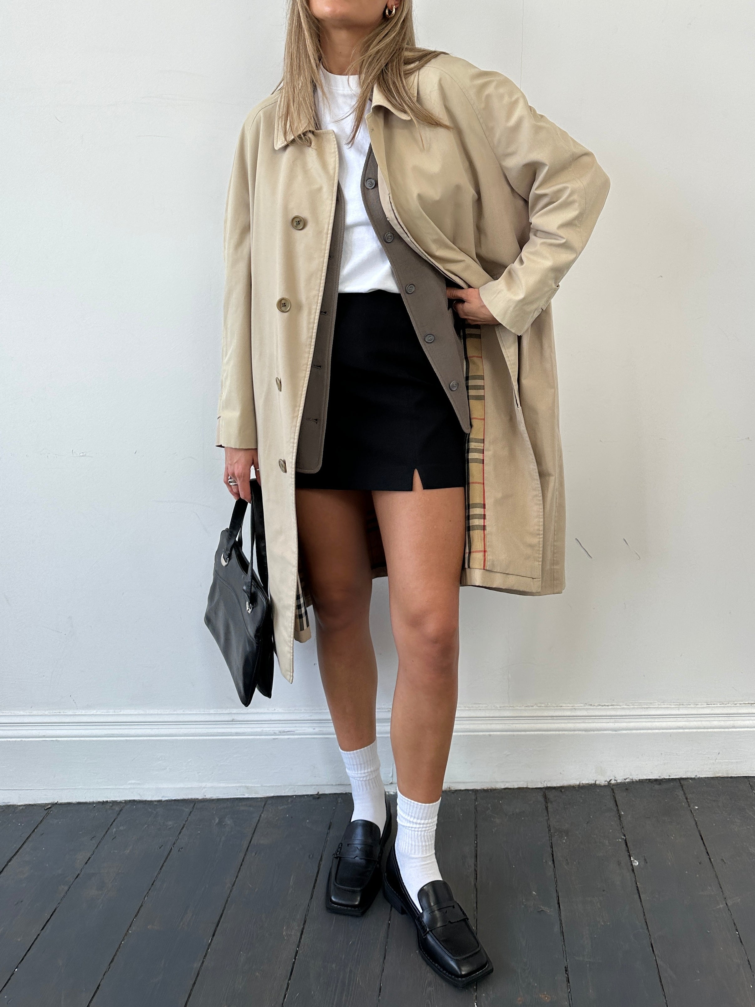 Burberry Nova Check trench coat in beige with black, white, and red check pattern, long sleeve design, size L.