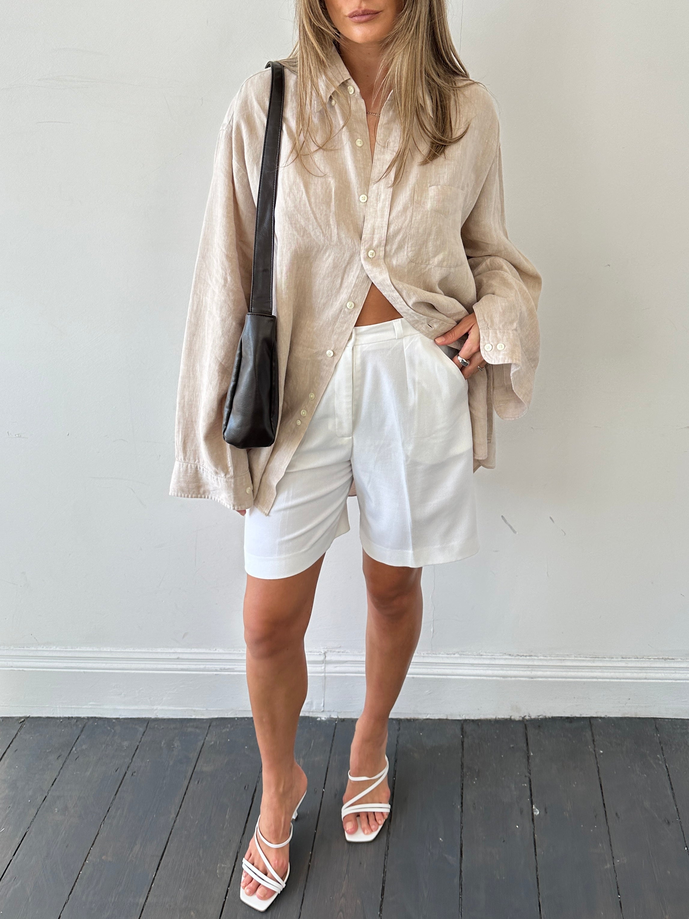 Brooks Brothers pure linen shirt in XL/XXL, displayed flat with collar and long sleeves, perfect for casual or summer wear.