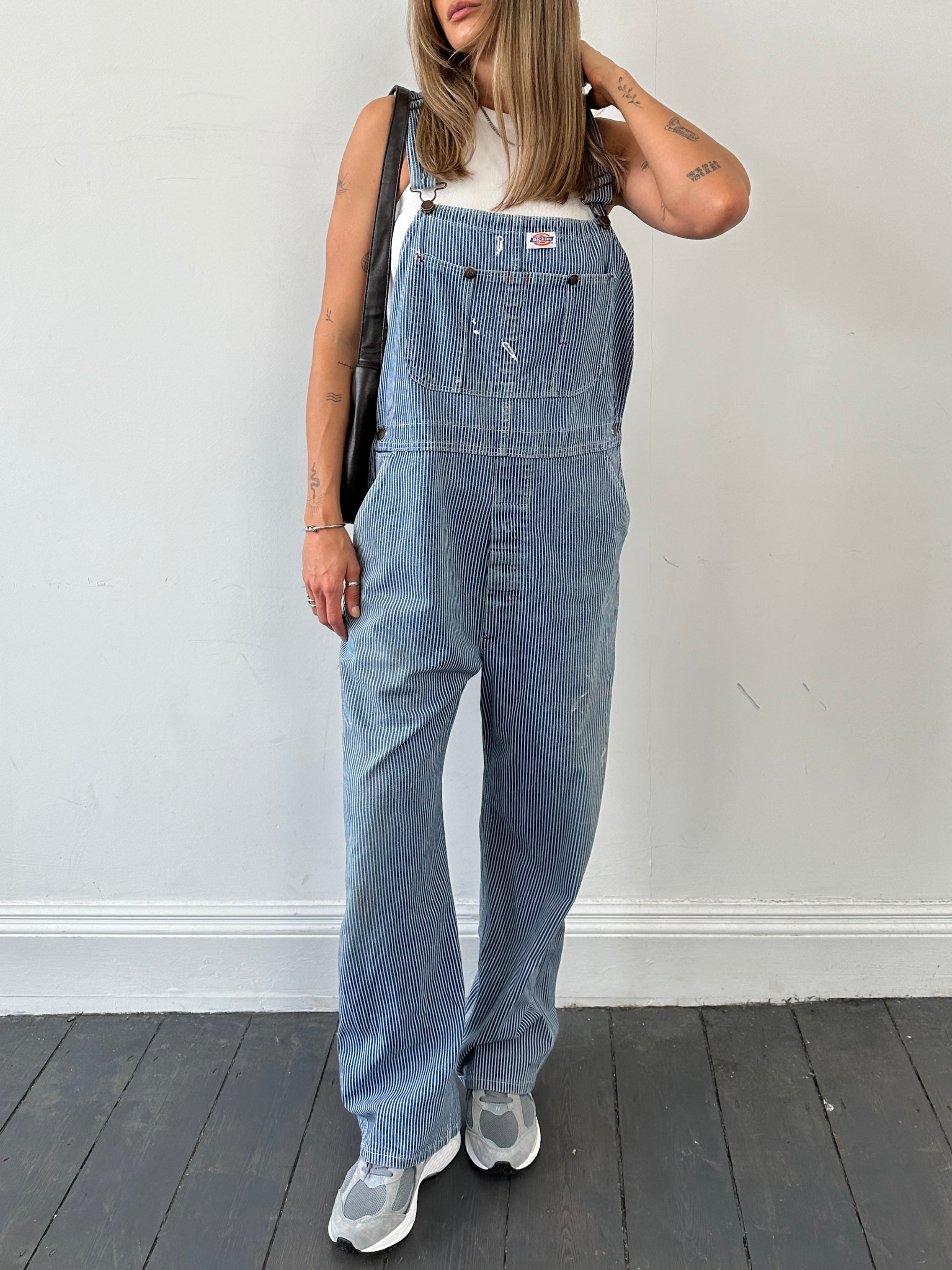 Dickies pinstripe pure cotton dungarees in size M/L, featuring shoulder straps and front pockets, casual workwear style.
