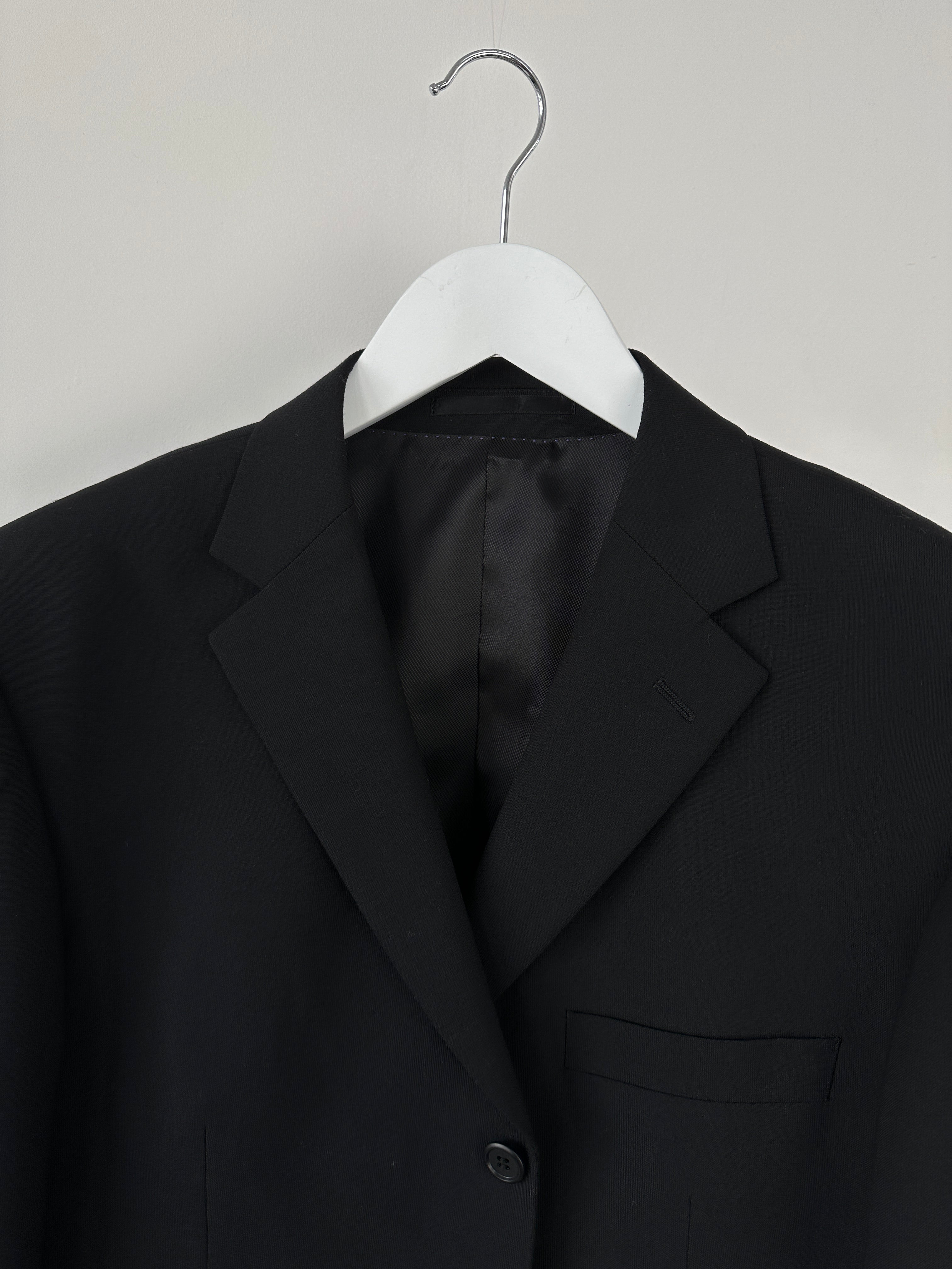 Vintage single-breasted wool blend suit jumpsuit in size 42R/W36, featuring a classic tailored design and structured fit.