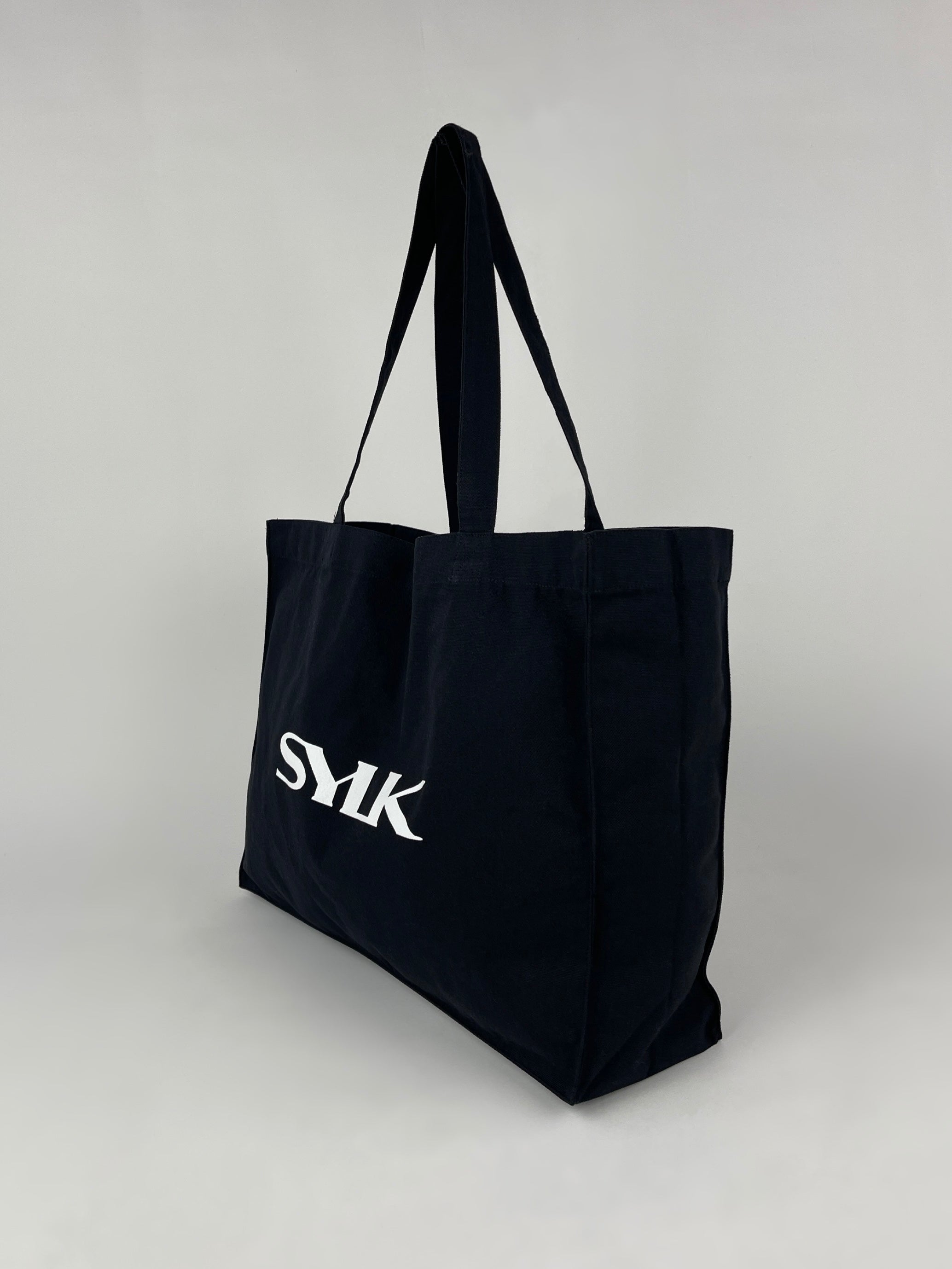 SYLK recycled cotton tote bag with natural handles and spacious interior, eco-friendly reusable bag for daily use