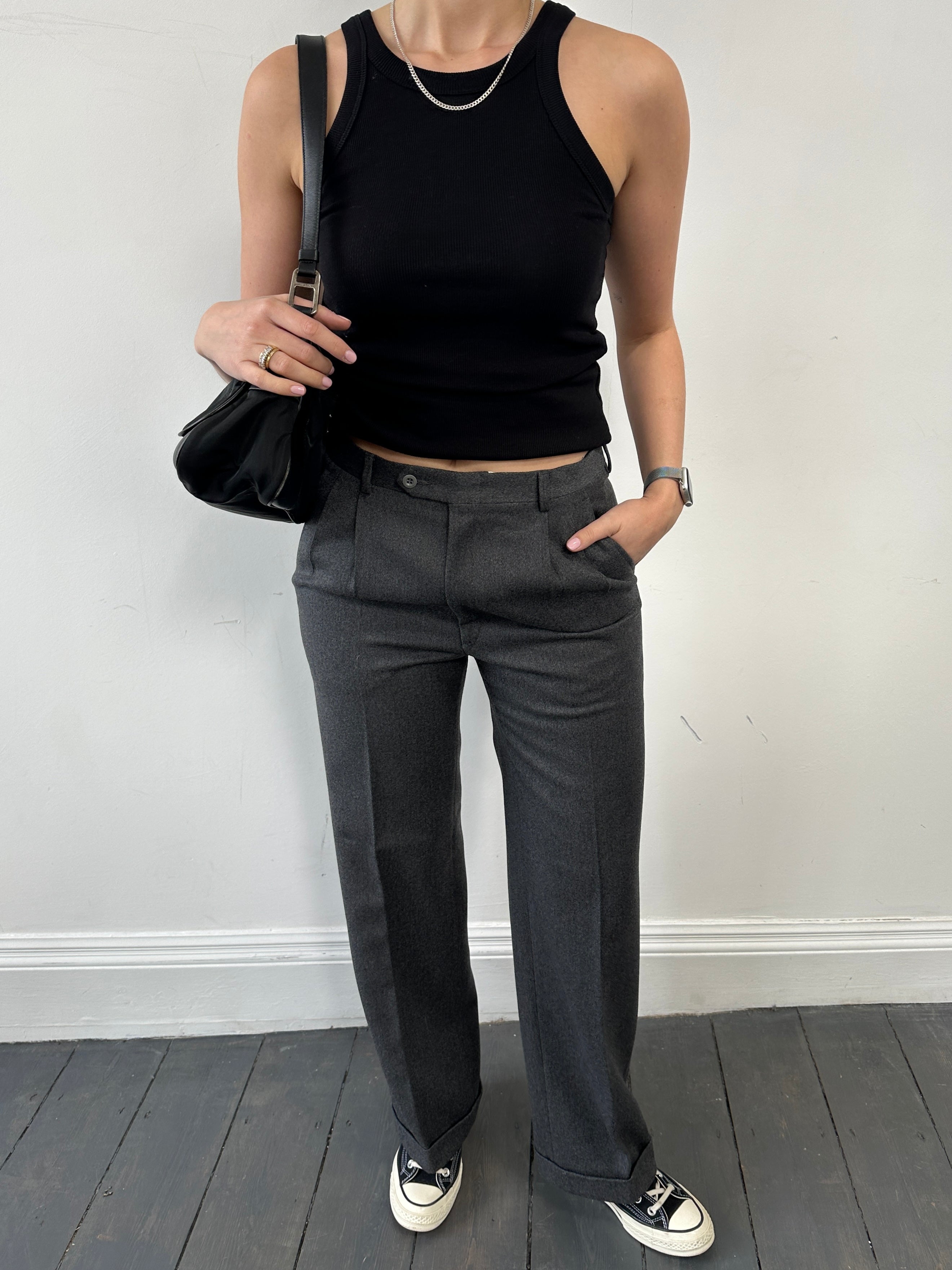 Vintage Italian tailored wool trousers with pleats and straight legs, size W30, showcasing classic craftsmanship and timeless style.