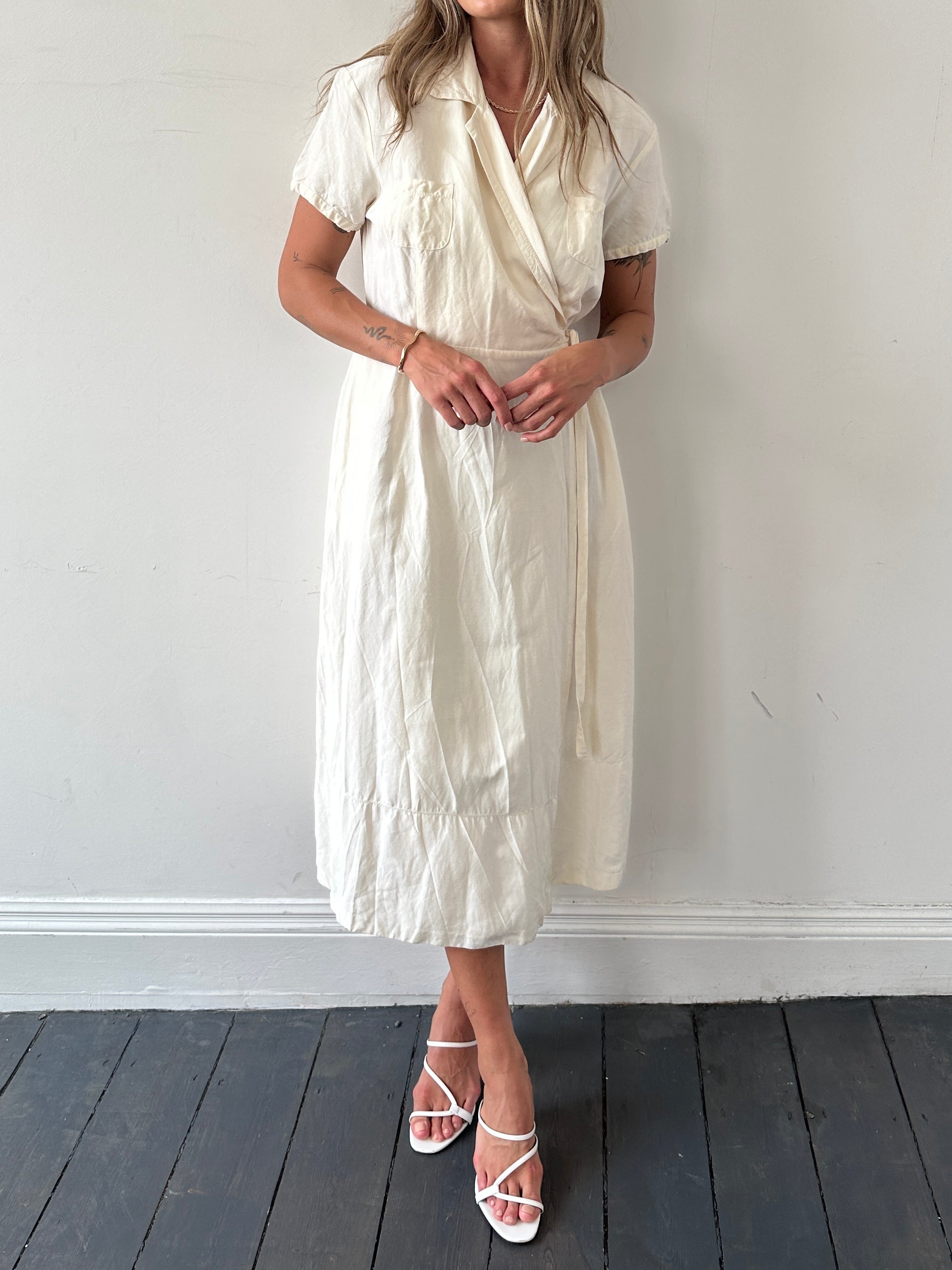 Laura Ashley silk linen maxi wrap dress in S/M, featuring a flowing silhouette and elegant design, ideal for stylish occasions.