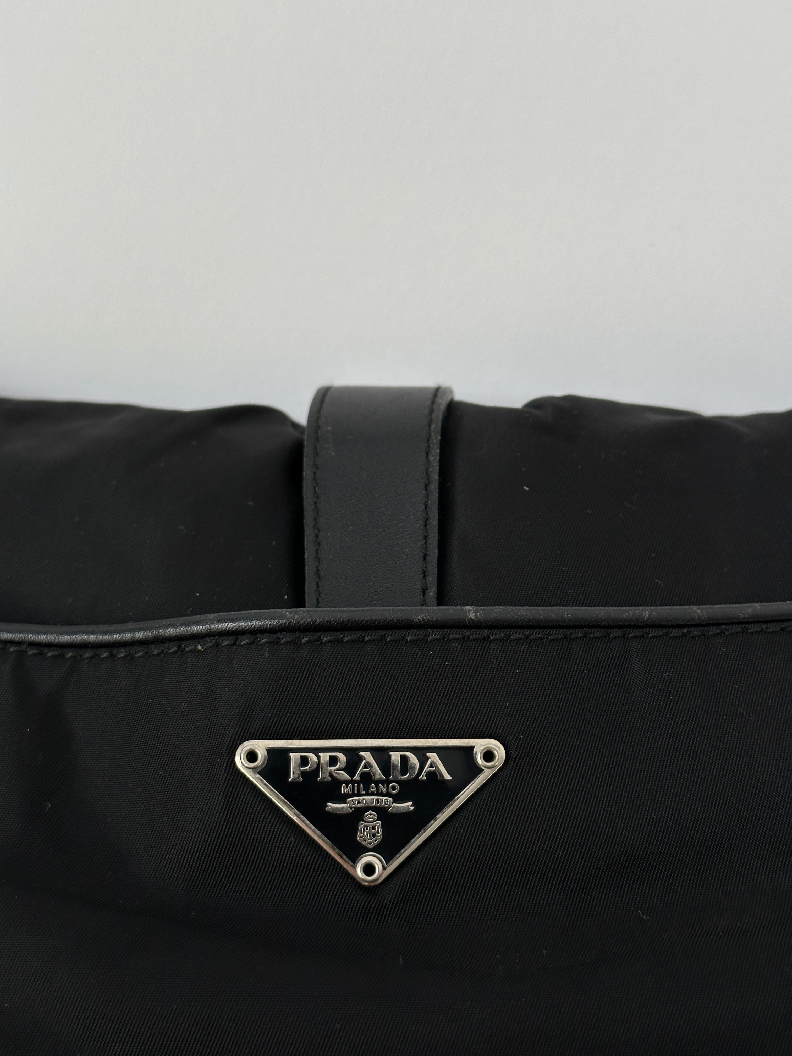 Prada 2000s Tessuto Nylon Double Sided Shoulder Bag showing the nylon exterior and double strap design.