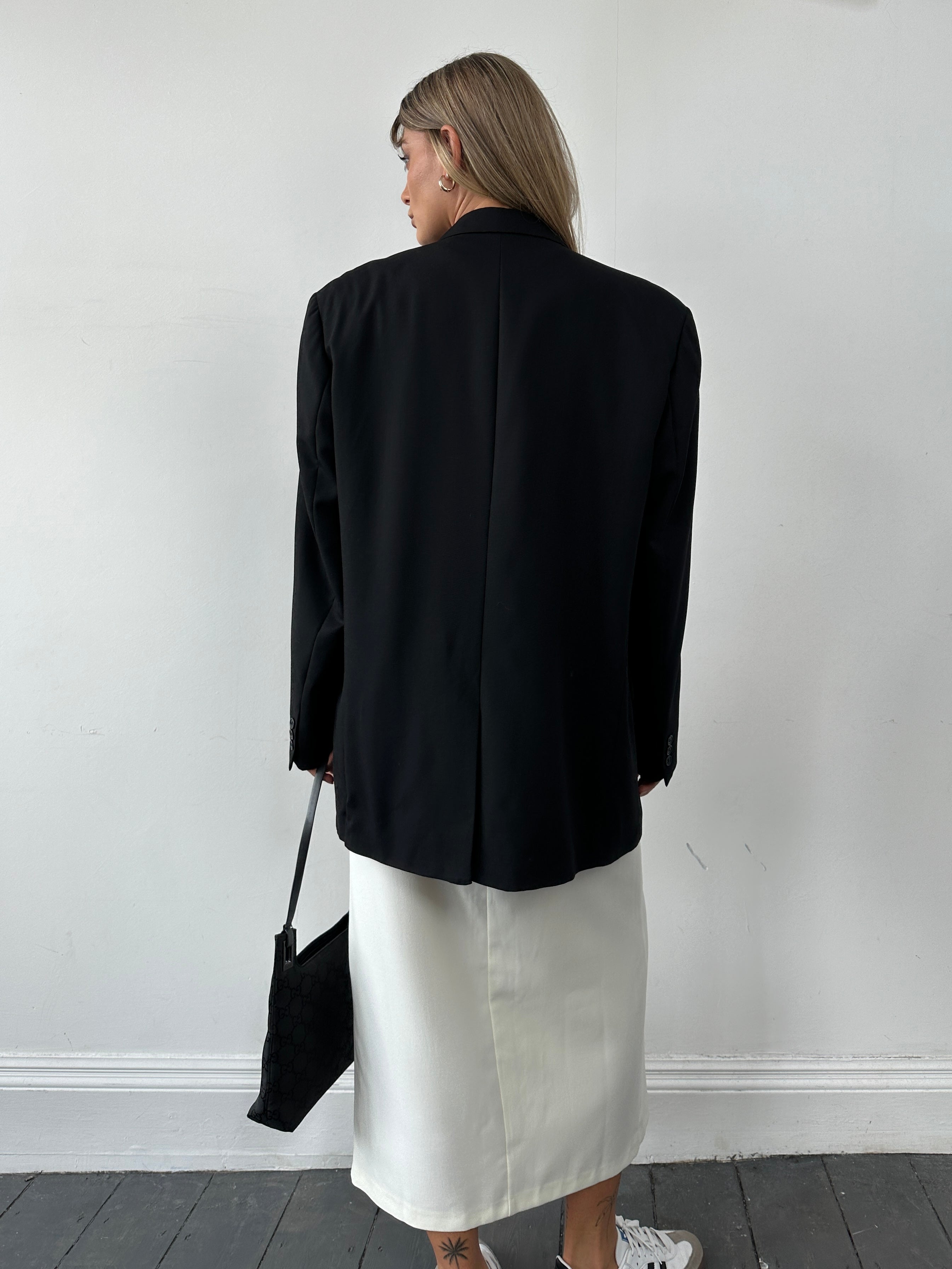 Vintage pure wool tailored single-breasted blazer in size 46/XL, shown in a classic design with notch lapels and structured fit.