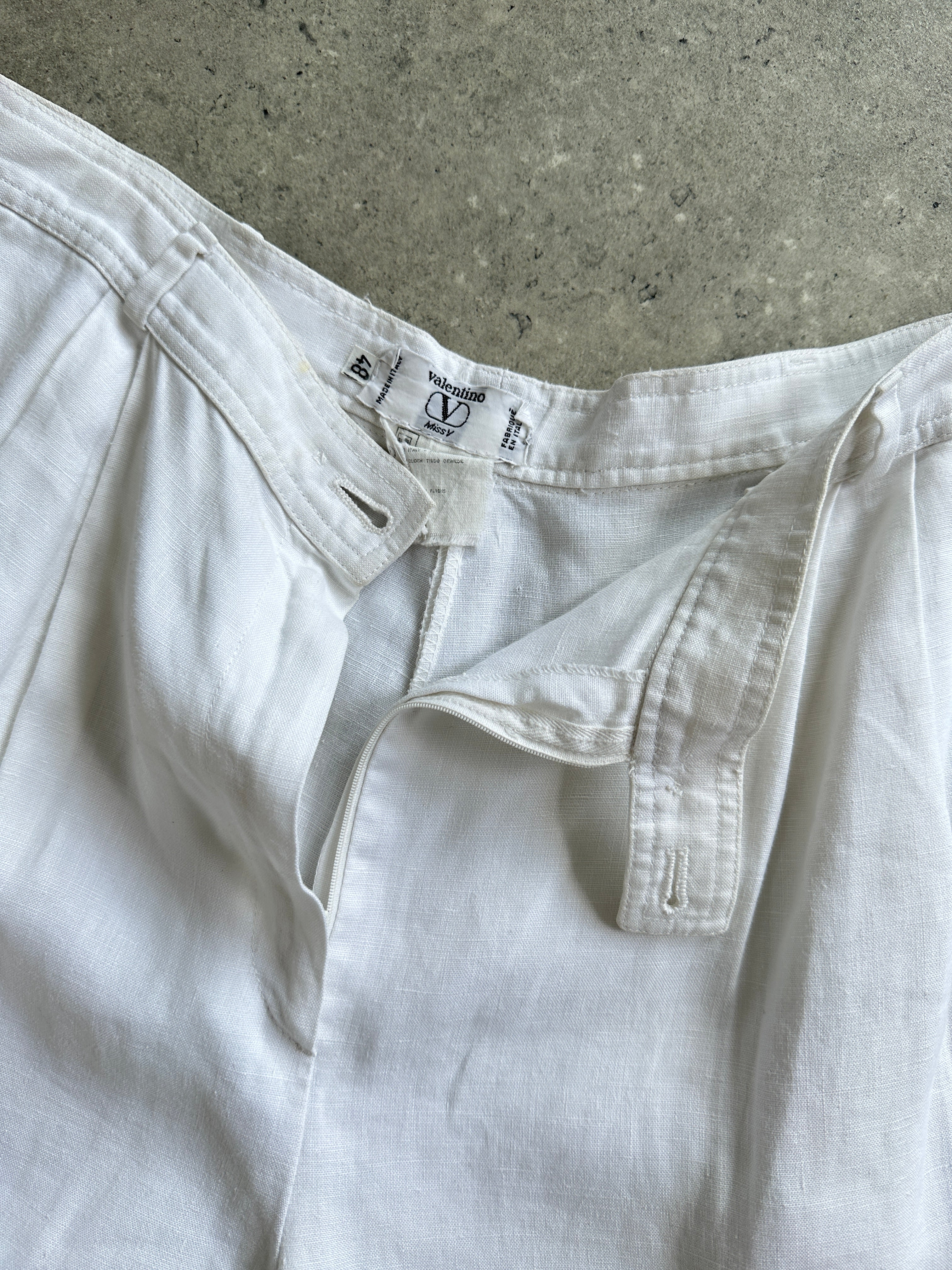 Valentino Miss V Pure Linen High Waisted Trousers in white, tailored with a sleek fit and wide leg design.