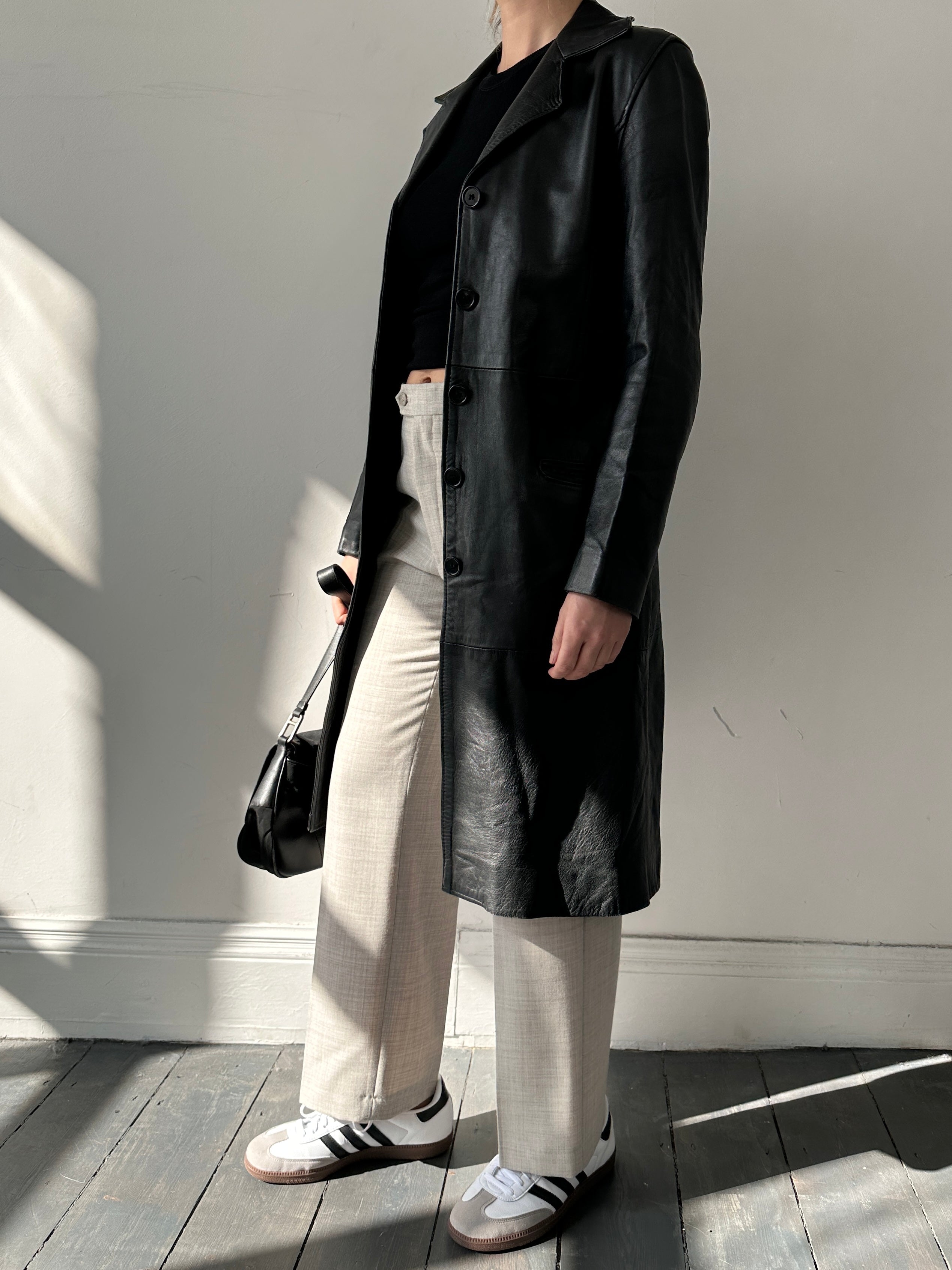 Vintage Italian vintage leather jacket in XS, featuring classic styling and authentic leather for a timeless look.