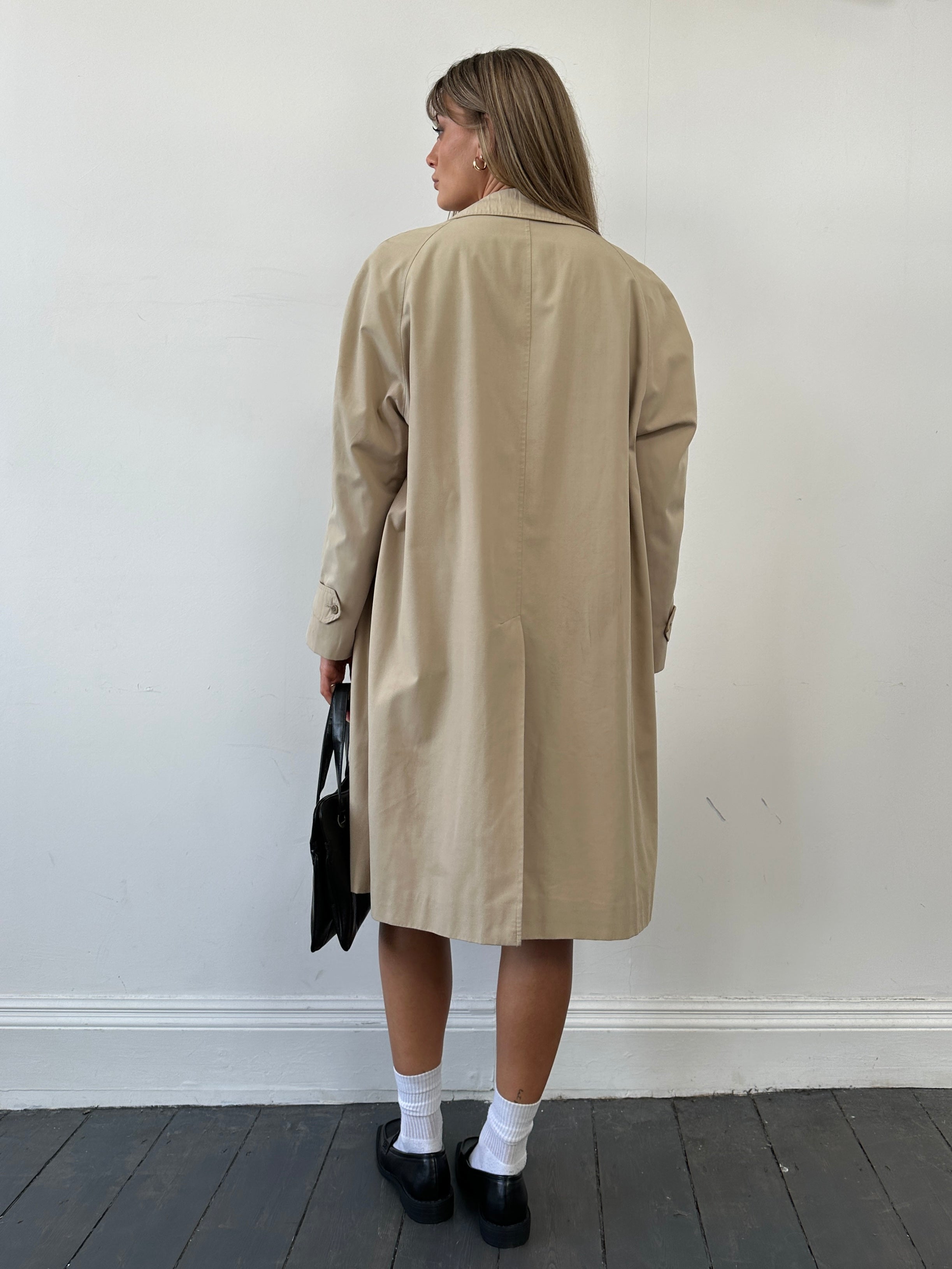 Burberry Nova Check trench coat in size L, featuring classic check pattern, beige fabric, and button closure.