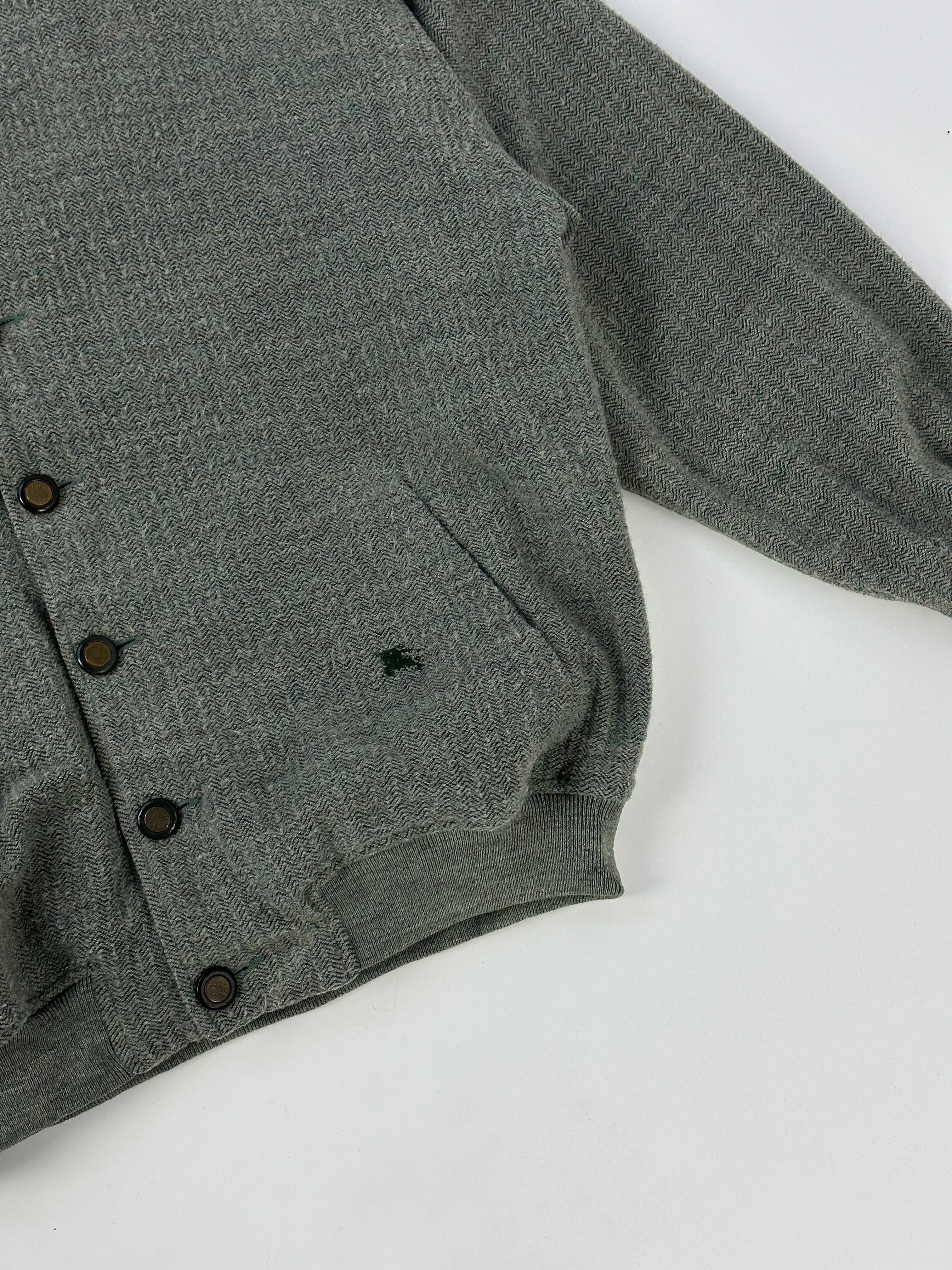 Green Burberry wool bomber jacket with embroidery logo, featuring a classic bomber jacket design and detailed stitching.