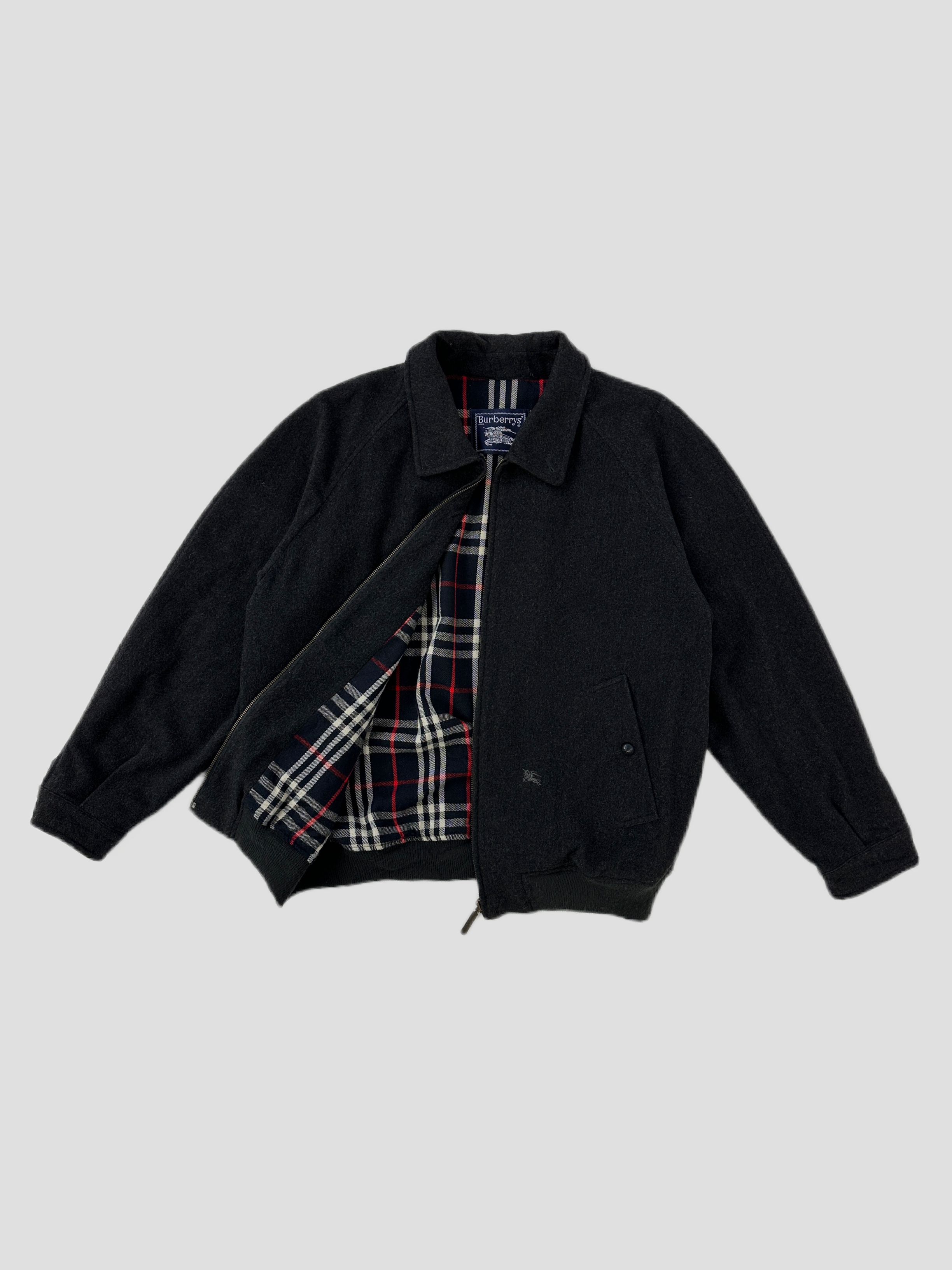Burberry Hamilton Nova Check wool cashmere bomber jacket in grey with logo details and ribbed cuffs, front zipper, and relaxed fit.