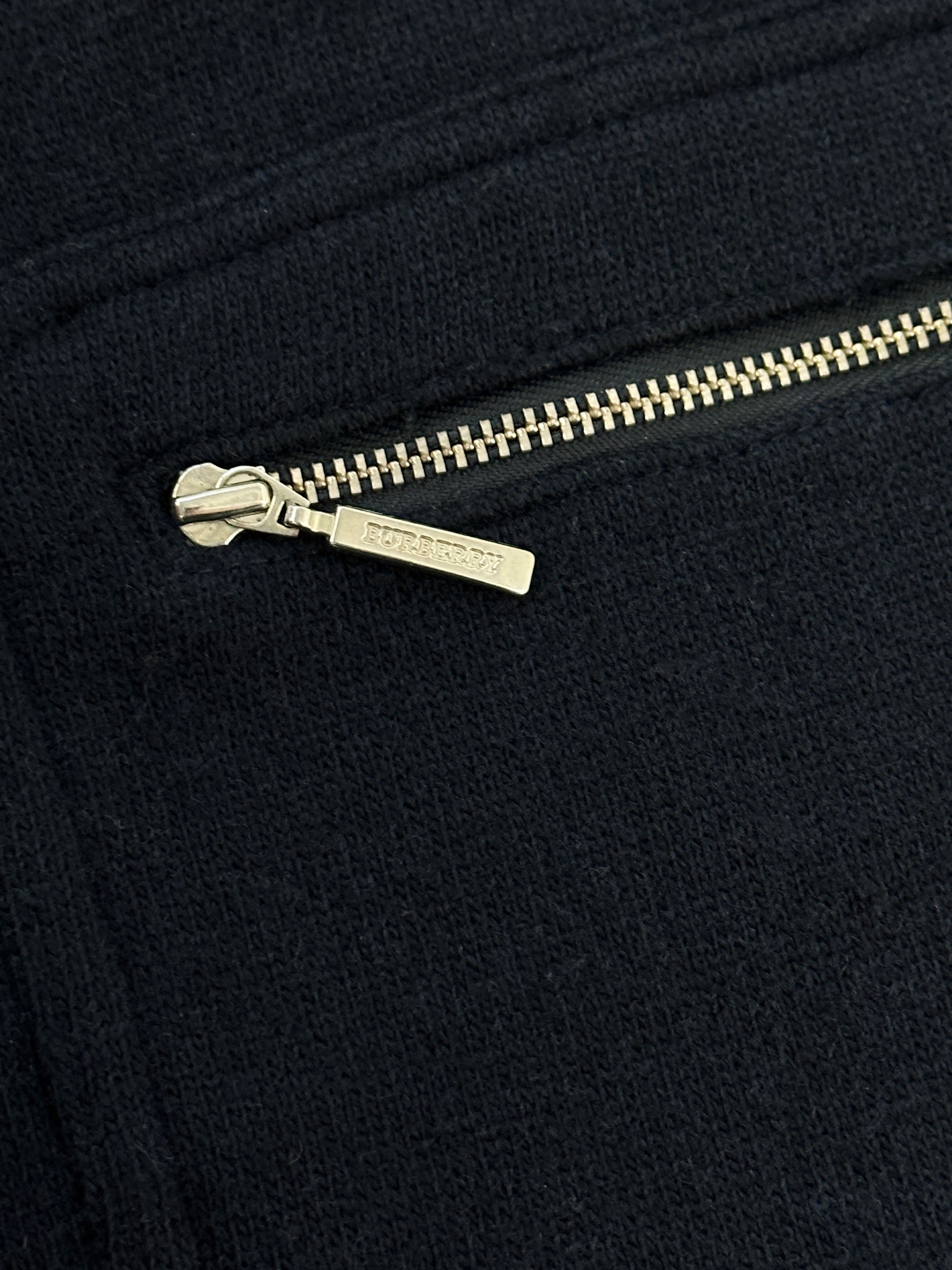 Burberry London Nova Check knitted wool jacket in navy, featuring a classic check pattern and tailored fit.