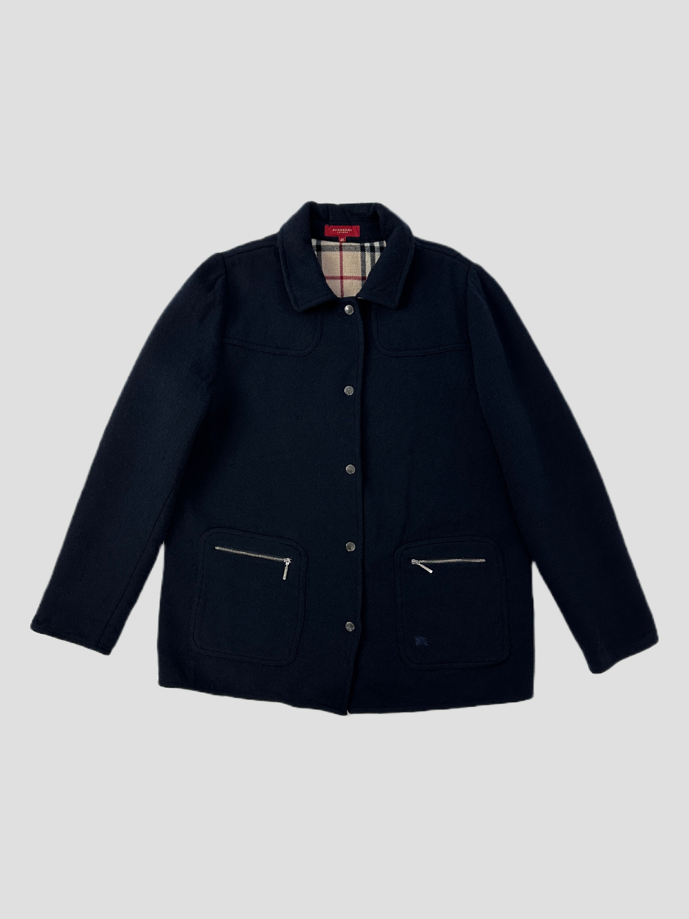 Navy Burberry London Nova Check knitted wool jacket with classic pattern, featuring a cozy and stylish design for cold weather.