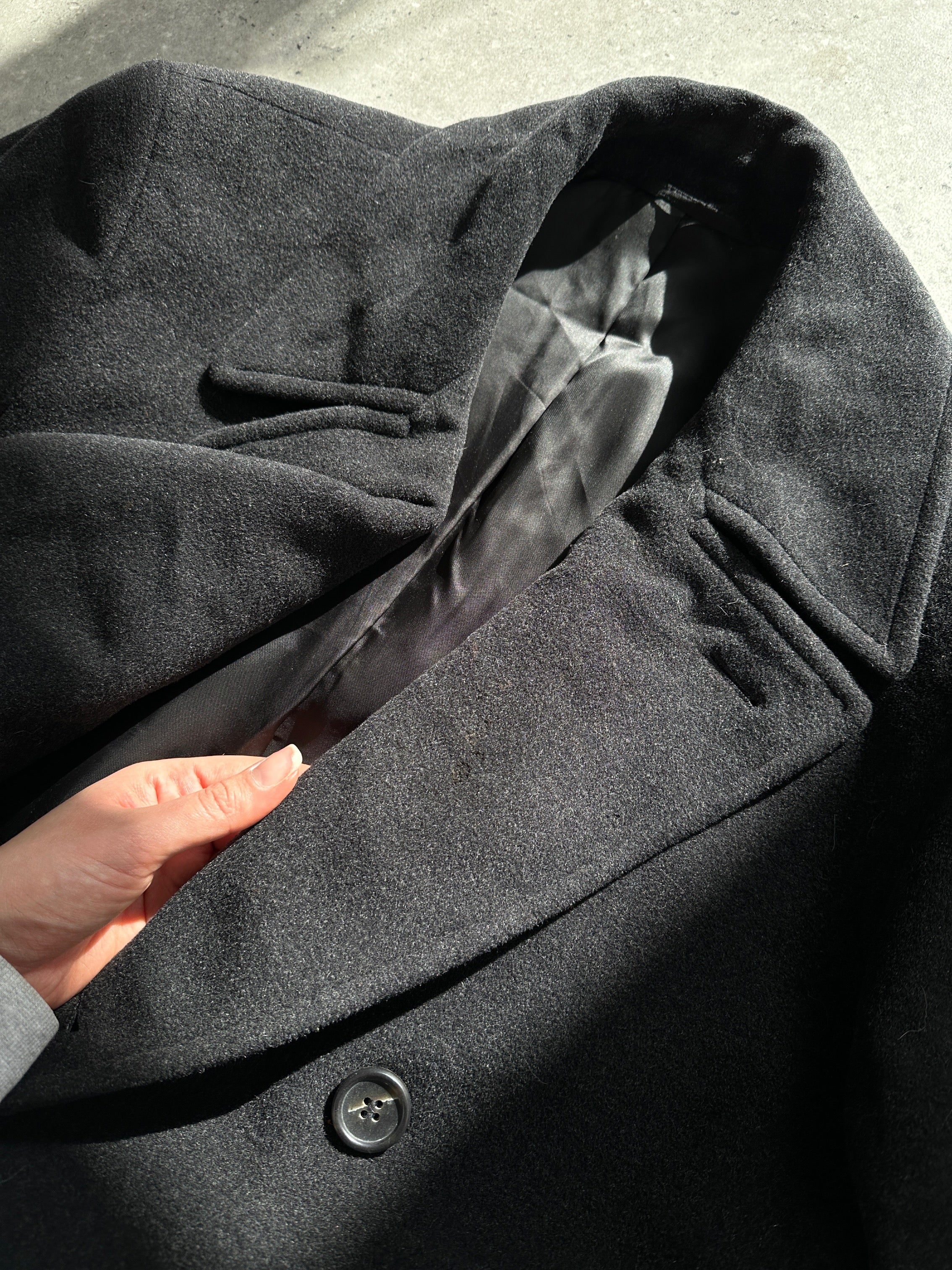 Hugo Boss belted virgin wool coat in XL style, featuring a classic design and tailored fit, displayed on a hanger.