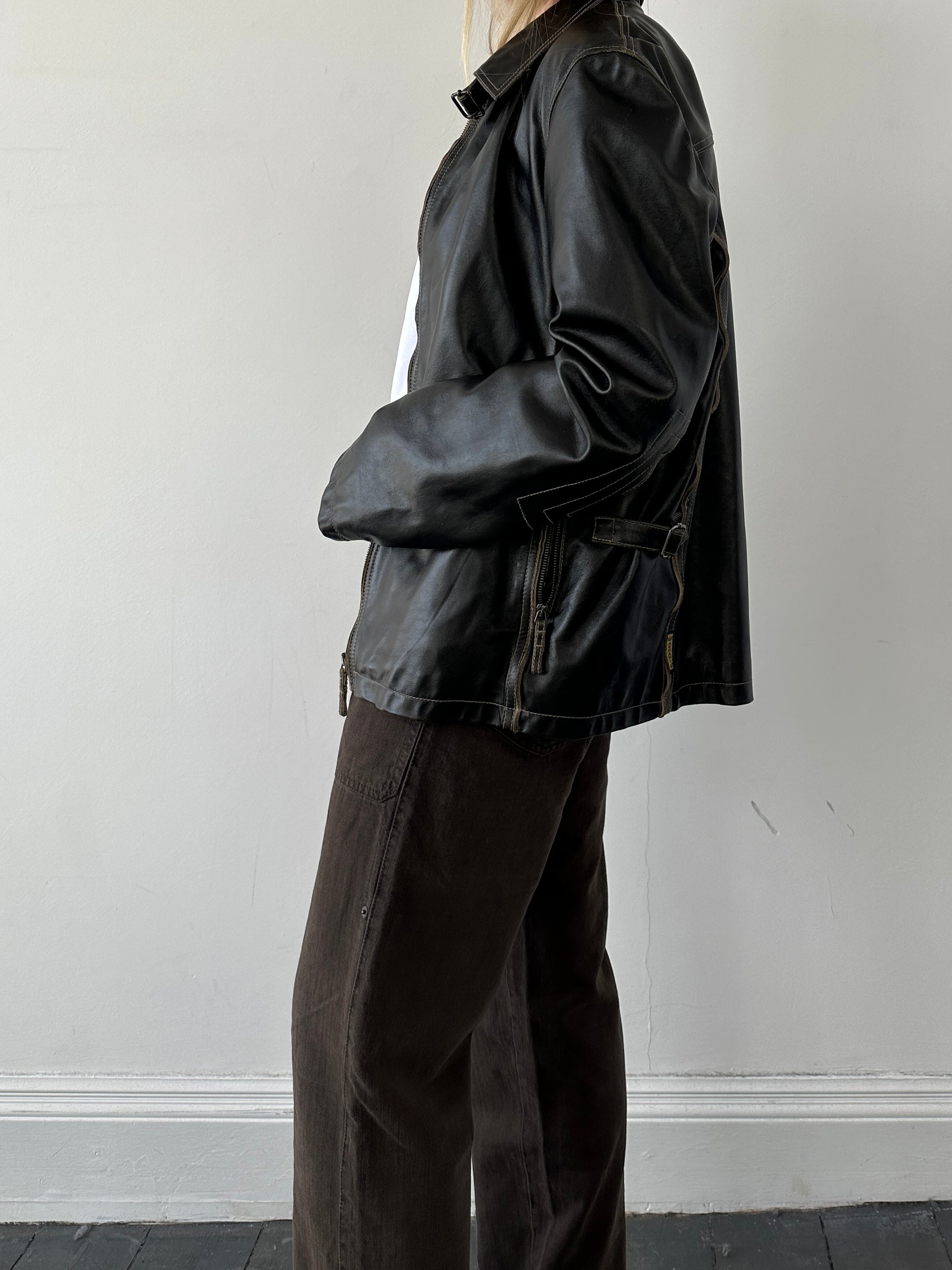 Armani Jeans contrast stitch leather jacket in size L, featuring stylish stitching and classic design, displayed on a hanger.