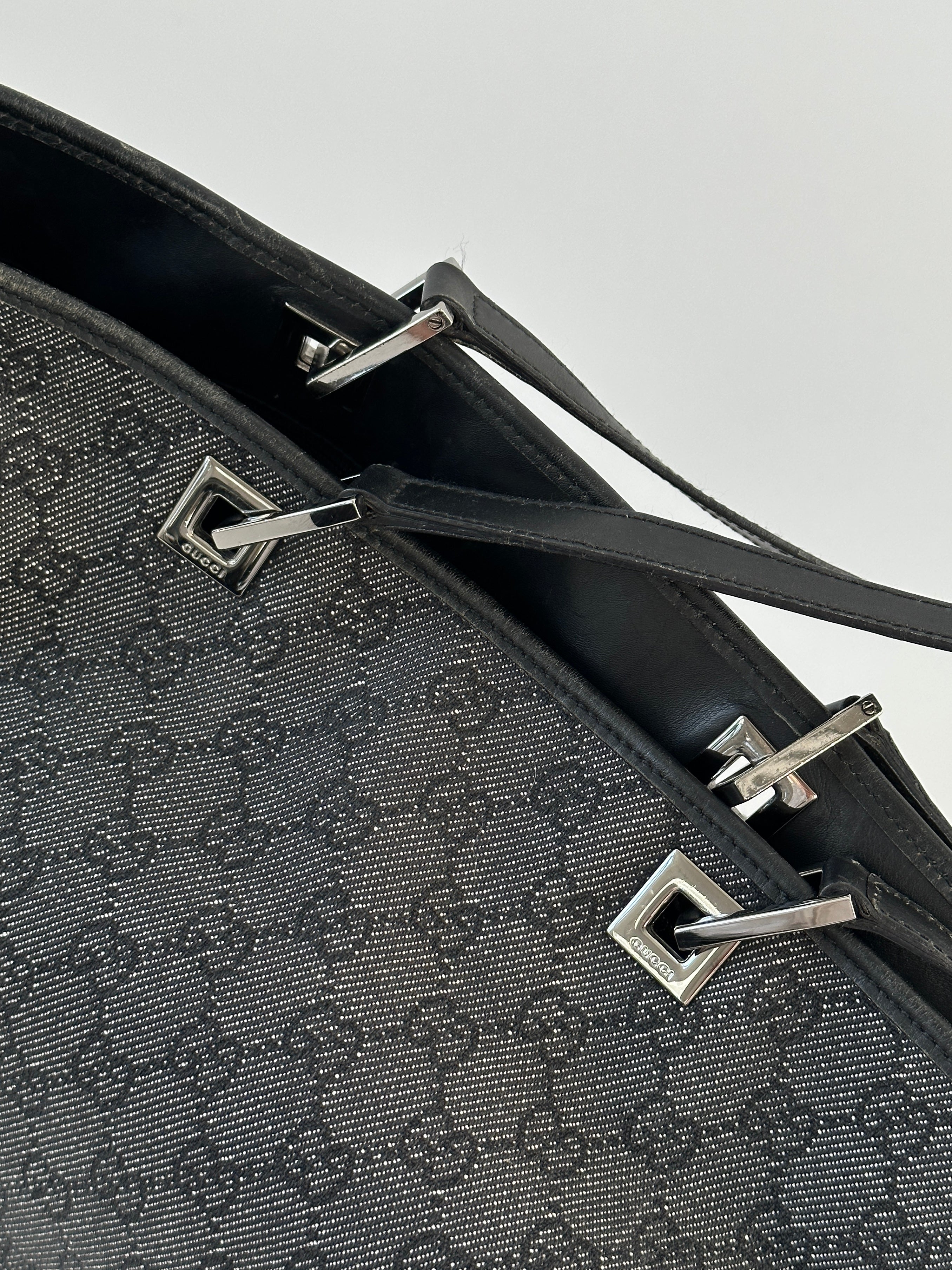 Gucci Monogram GG Bucket Tote Bag with adjustable shoulder strap and spacious interior, featuring signature monogram pattern.