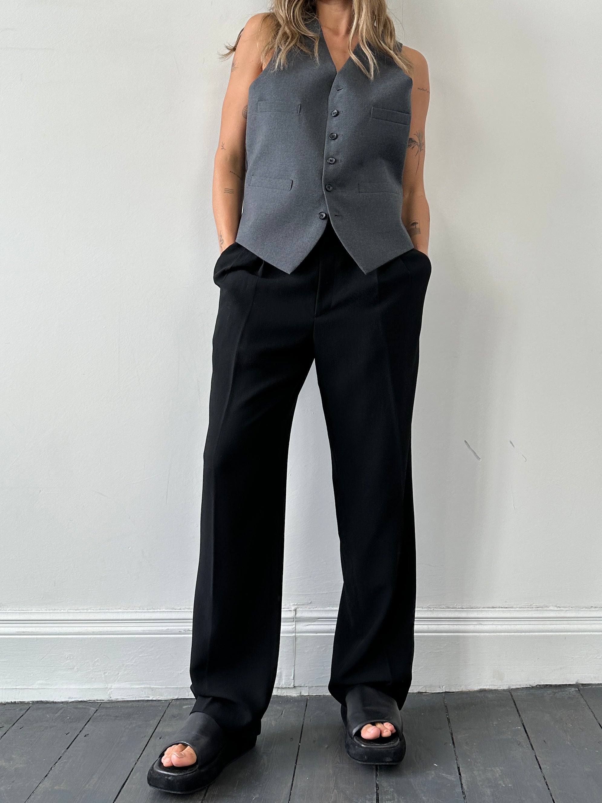 Vintage British two-piece blazer and waistcoat set, size M/42, featuring classic tailored design and traditional fabric details.