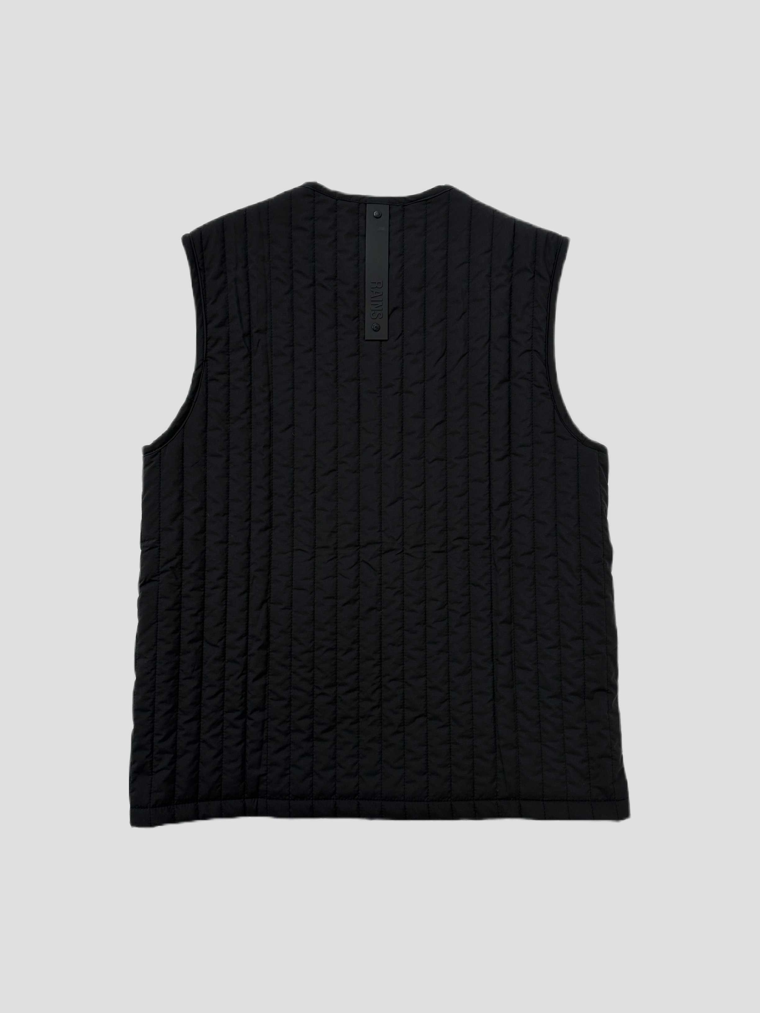 Rains waterproof zip-up liner vest gilet in black, shown on a hanger, designed for lightweight rain protection and layering.